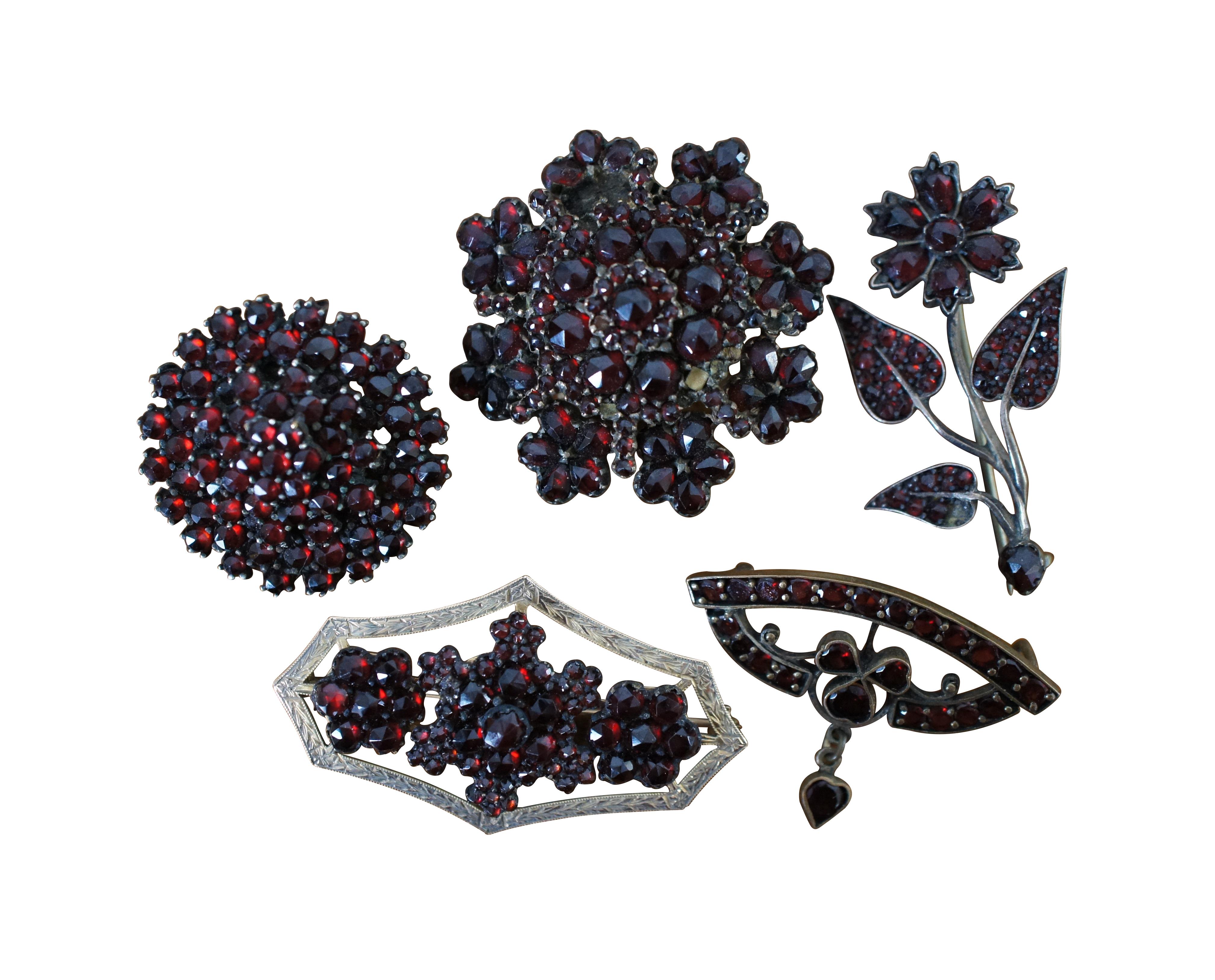 Antique and vintage lot of red Garnet jewelry featuring pins / brooches / pendants / bracelet and earrings.  Earrings and bracelet 800 silver.  Scalloped Diamond shape pin 10K gold.  

Dimensions:
Largest Piece (Bracelet) - 6” x 0.125” x 0.375” /