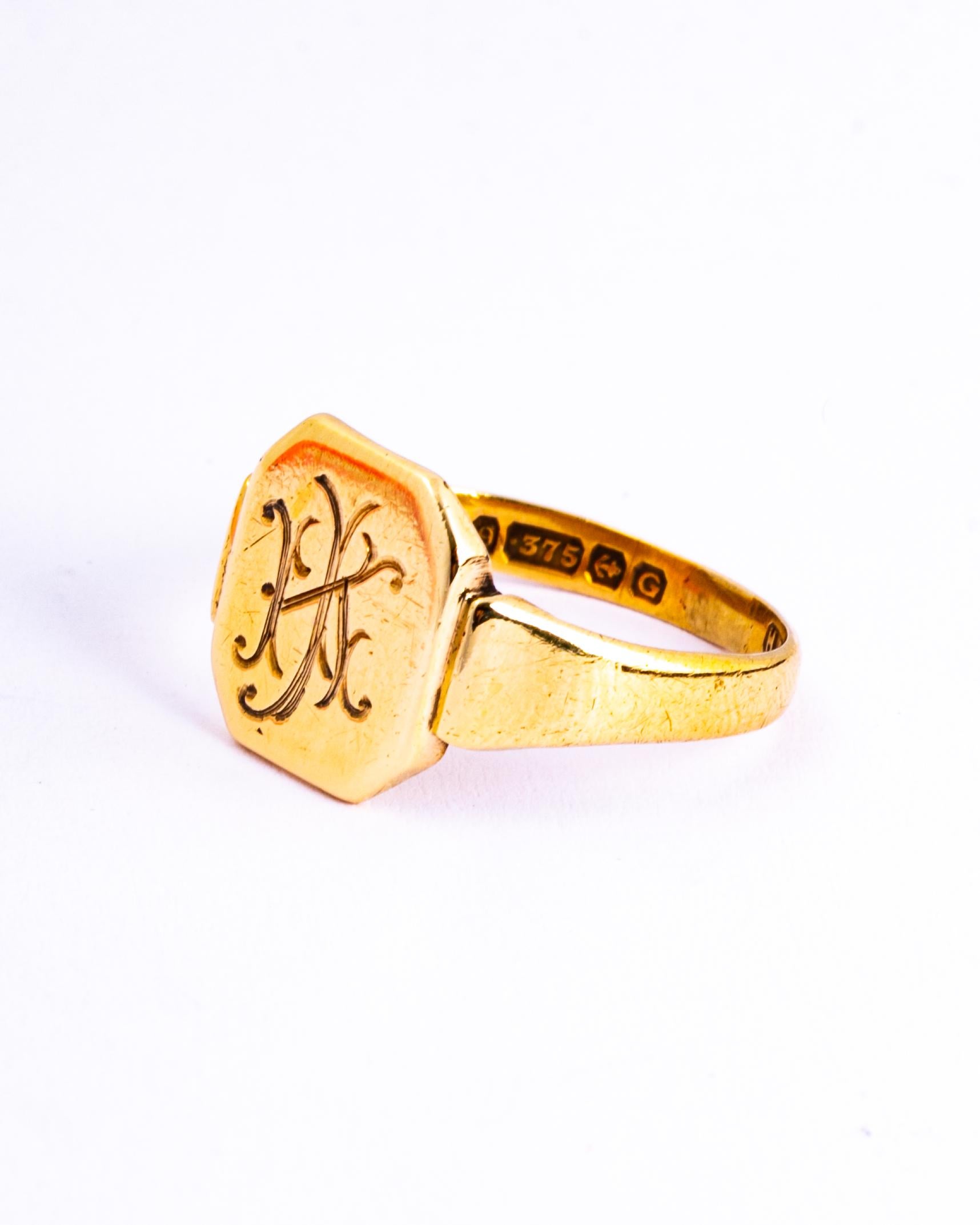 This signet ring is has a classic face and is modelled in 9ct gold. The face has initials which read 'KJ' and it also has moulded shoulders. Made in Birmingham, England. 

Size: N or 6 3/4 
Face Dimensions: 10x11.5mm 

Weight: 2.6g