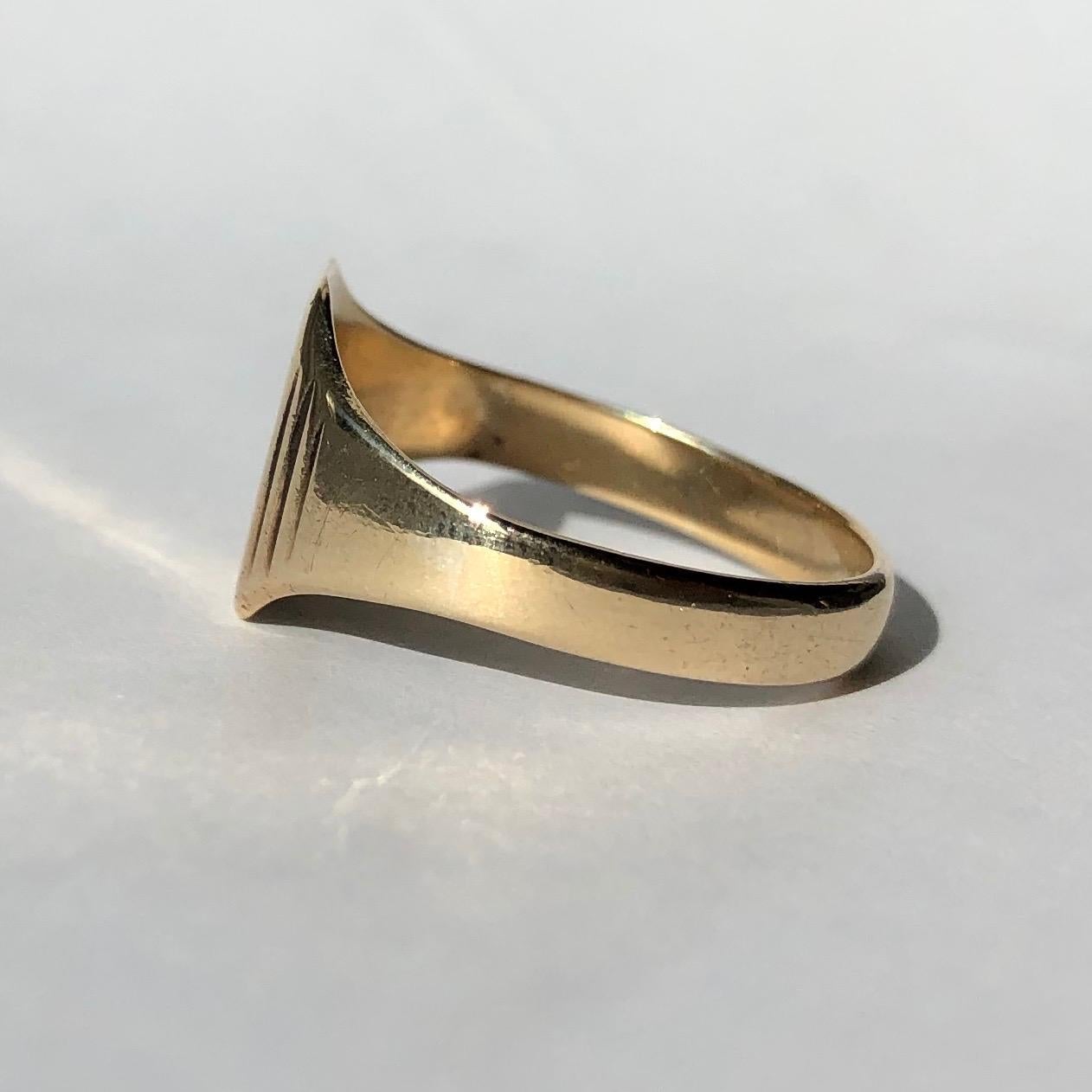 This signet ring is the classic soft octagon shape and is modelled in 9ct gold. The face has initials reading 'AR' or 'RA'. 

Size: Q 1/2 or 8 1/2
Face Dimensions: 9x11mm 

Weight: 2.82g