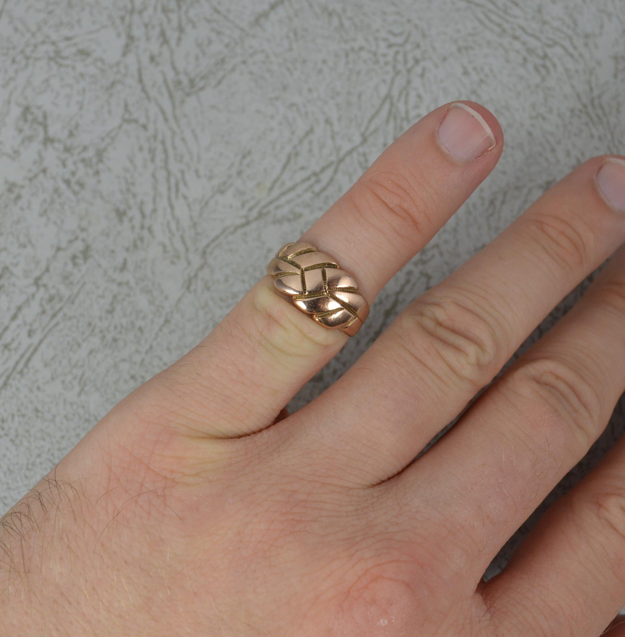 
A beautiful late Victorian period 9 carat rose gold ring. 

​English made piece. Edwardian era.

Size H UK, 3 3/4 US. 3.3 Grams. 9mm wide band to front.

Light wear only.