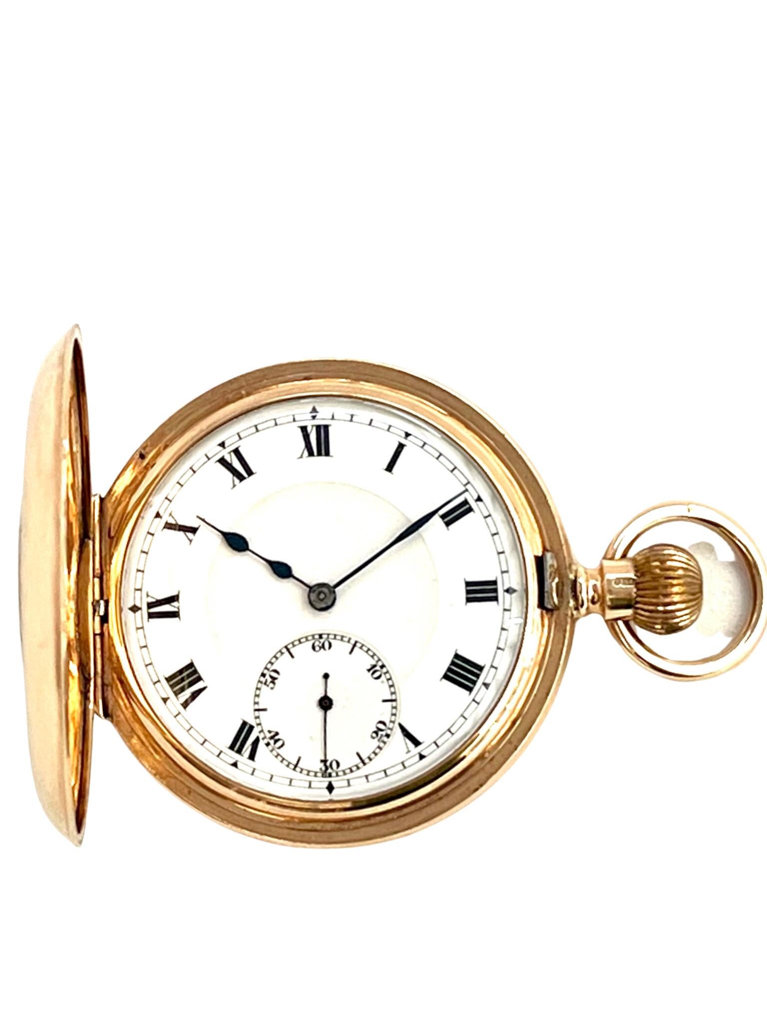 A substantial 9 carat solid gold half hunter pocket watch by Syren Watch Company, Switzerland. Fully hallmarked Chester, 1922

With a gold winding crown and bow to the top, the outer engraved Roman dial on the case front with central glass and