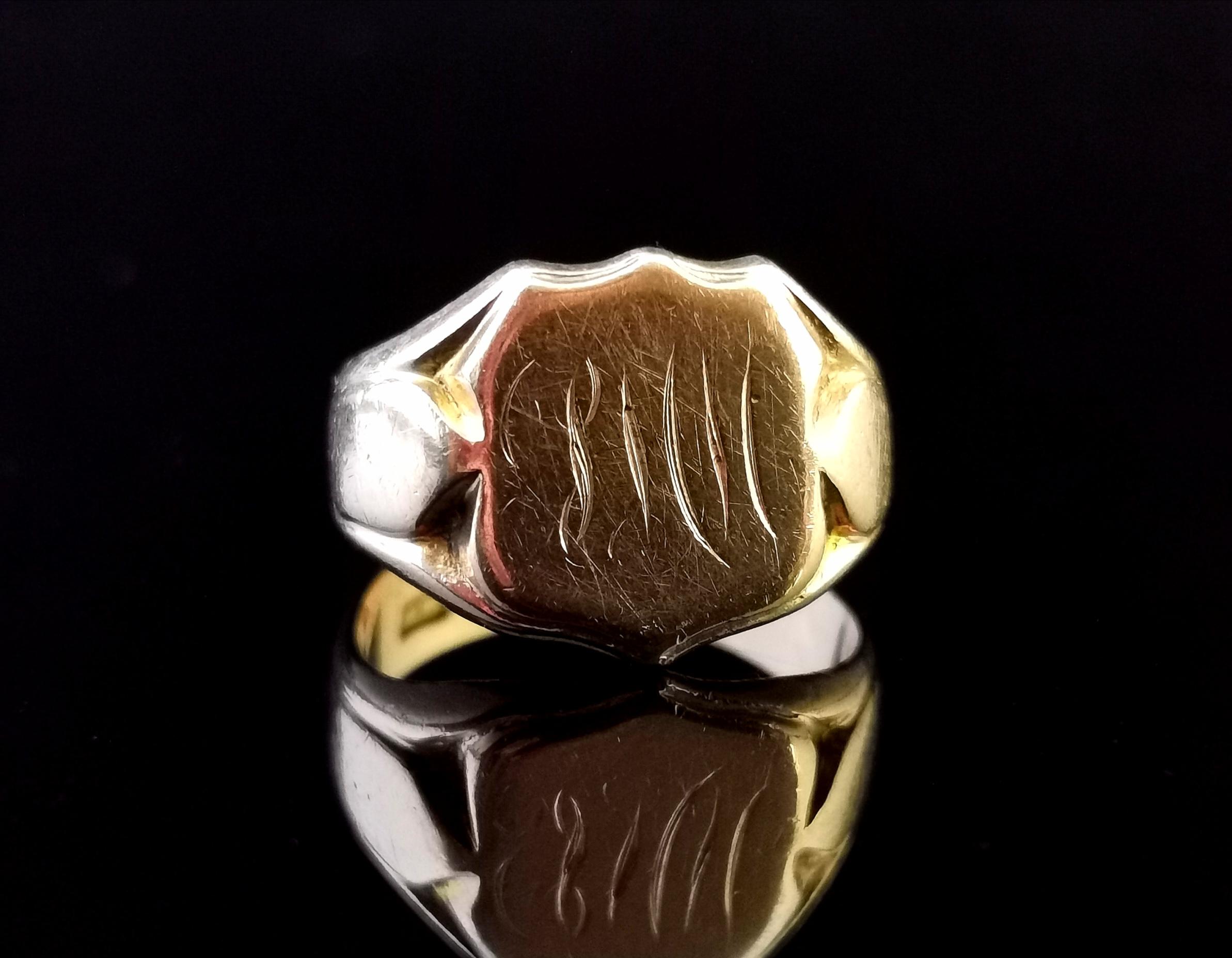 A gorgeous antique 9 karat Rose gold signet ring. 

It has a shield shaped face with an engraved monogram of initials, this is a little worn but I believe it is SMM. 

It has a smooth tapered gold band with decorative grooved shoulders. 

Fully