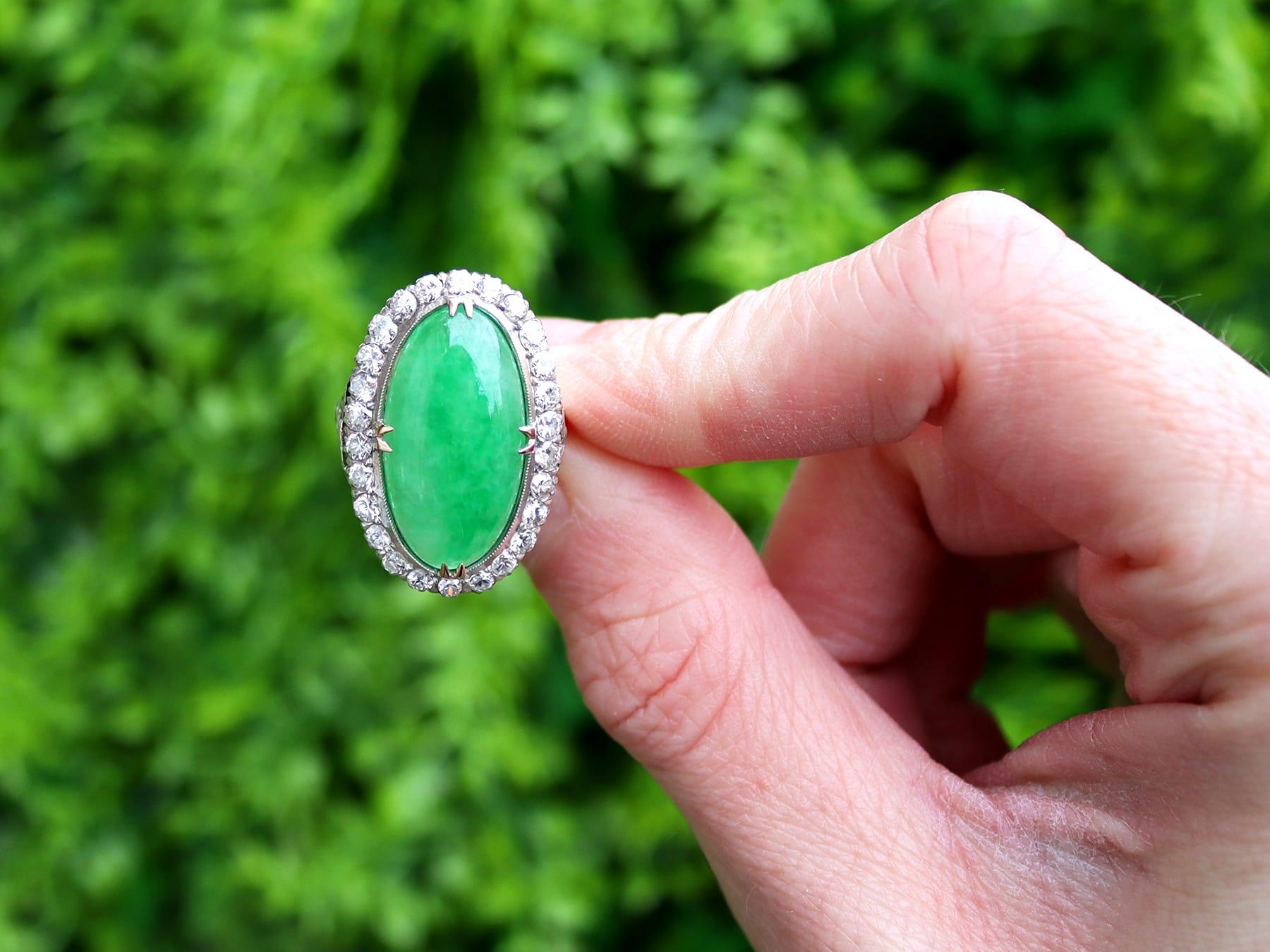 A stunning, fine and impressive antique 9.10 carat jadeite and 1.56 carat diamond, 9 karat yellow gold and silver set dress ring; part of our diverse antique ring collection.

This stunning, fine and impressive antique jade ring has been crafted in