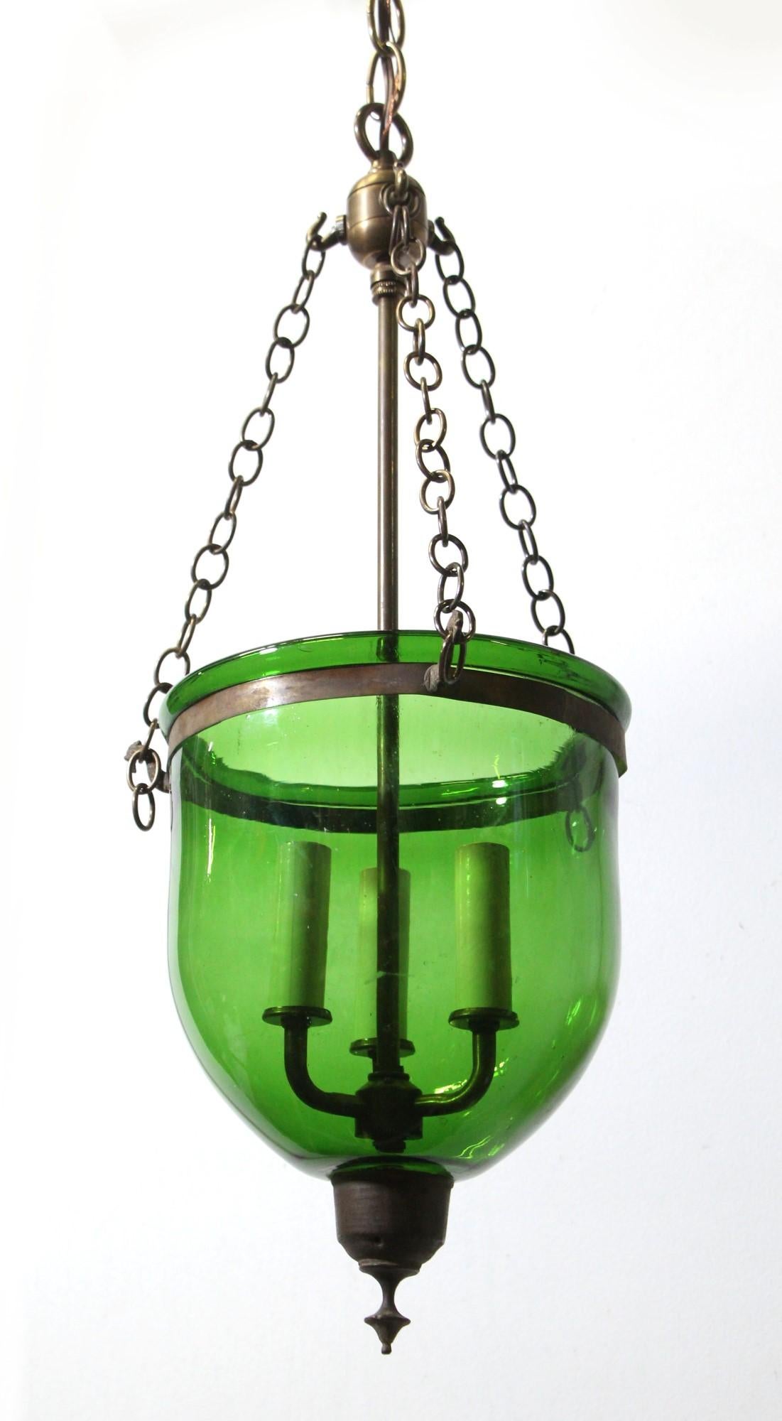 Antique hand blown green glass bell jar pendant light newly rewired with brass hardware. This can be seen at our 400 Gilligan St location in Scranton, PA. Measures: 9.5 in.