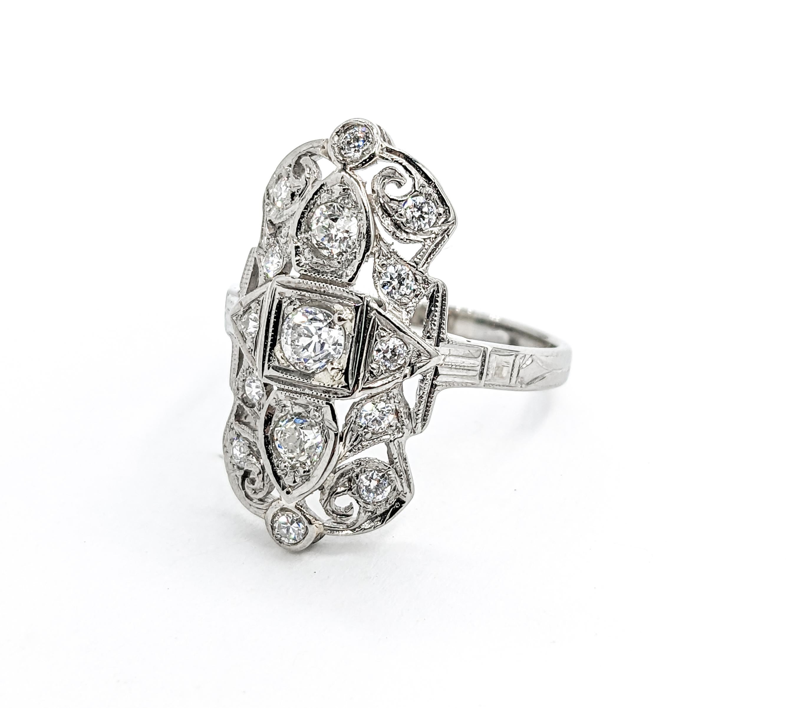 Antique .96ctw Diamond Shield Ring In White Gold

Discover the enchantment of Art Deco elegance with this stunning Antique Diamond Ring. Meticulously crafted in 18k white gold, this piece features a beautiful Milgrain detail design. At the heart of