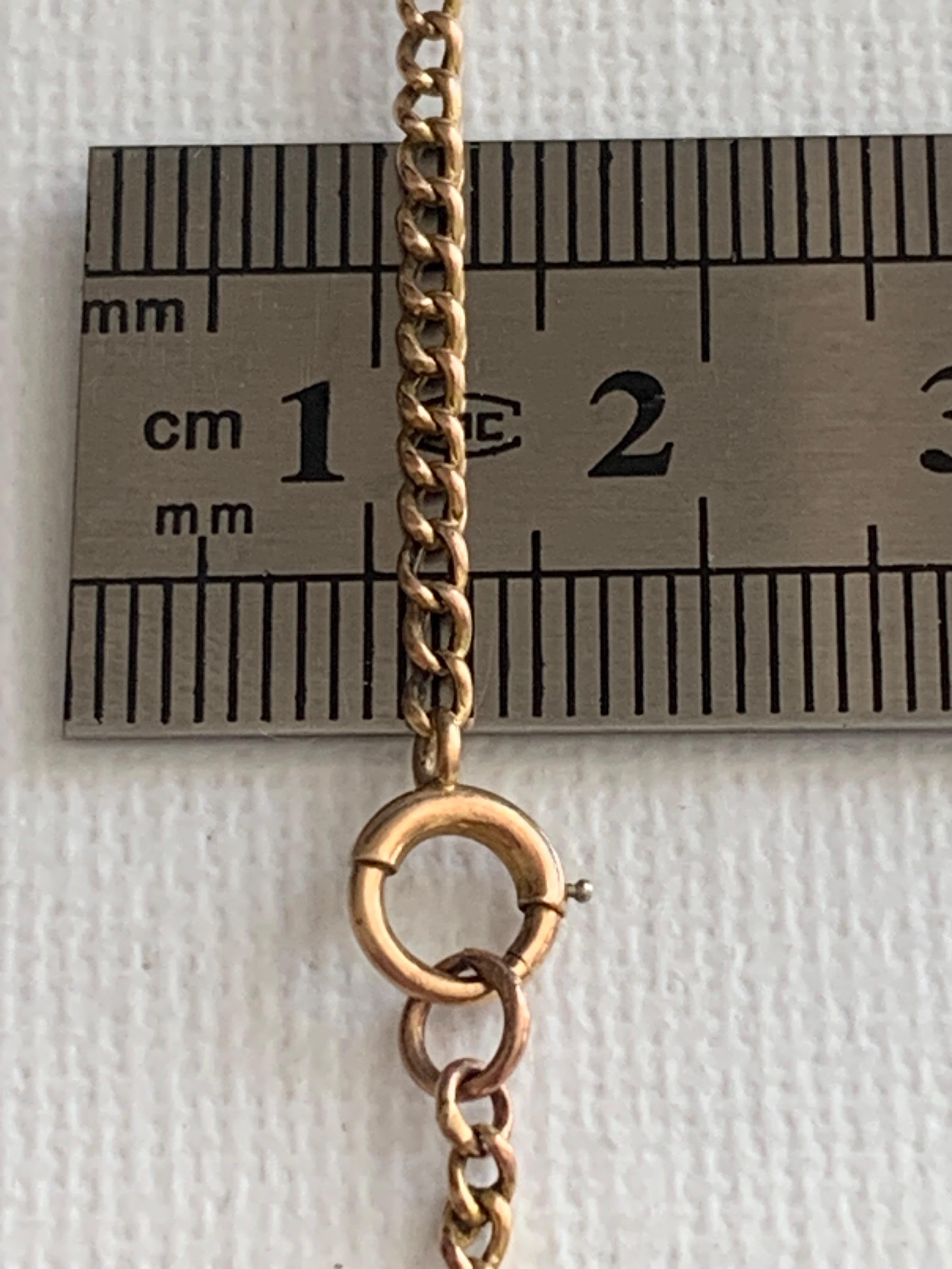 Antique Circa 1910
9ct 375 Hint of Rose Gold Chain
with a 9c stamped oval Plaque 
present near clasp attached to Chain
Length - 18.75 
