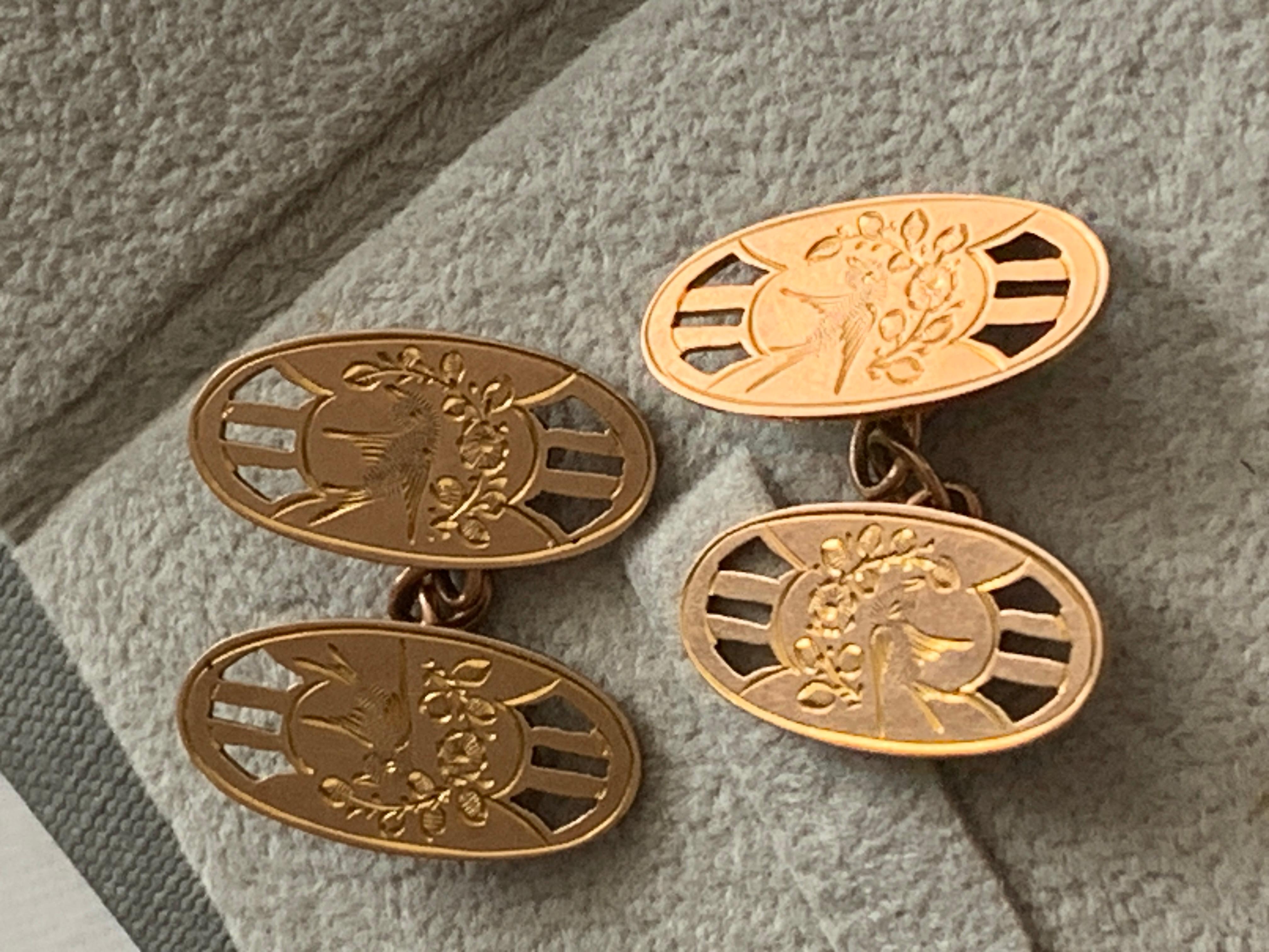 Stunning Antique
9ct 375 Rose Gold Cufflinks
Circa 1800s
Date Letter B
Goldsmith S.BROS
With Beautiful Bird & flower design
popular during Victorian Era
Hallmarked on each Cuff link 
and also on Chains ( 9 375)
Size of each Oval CuffLink is 19mm x