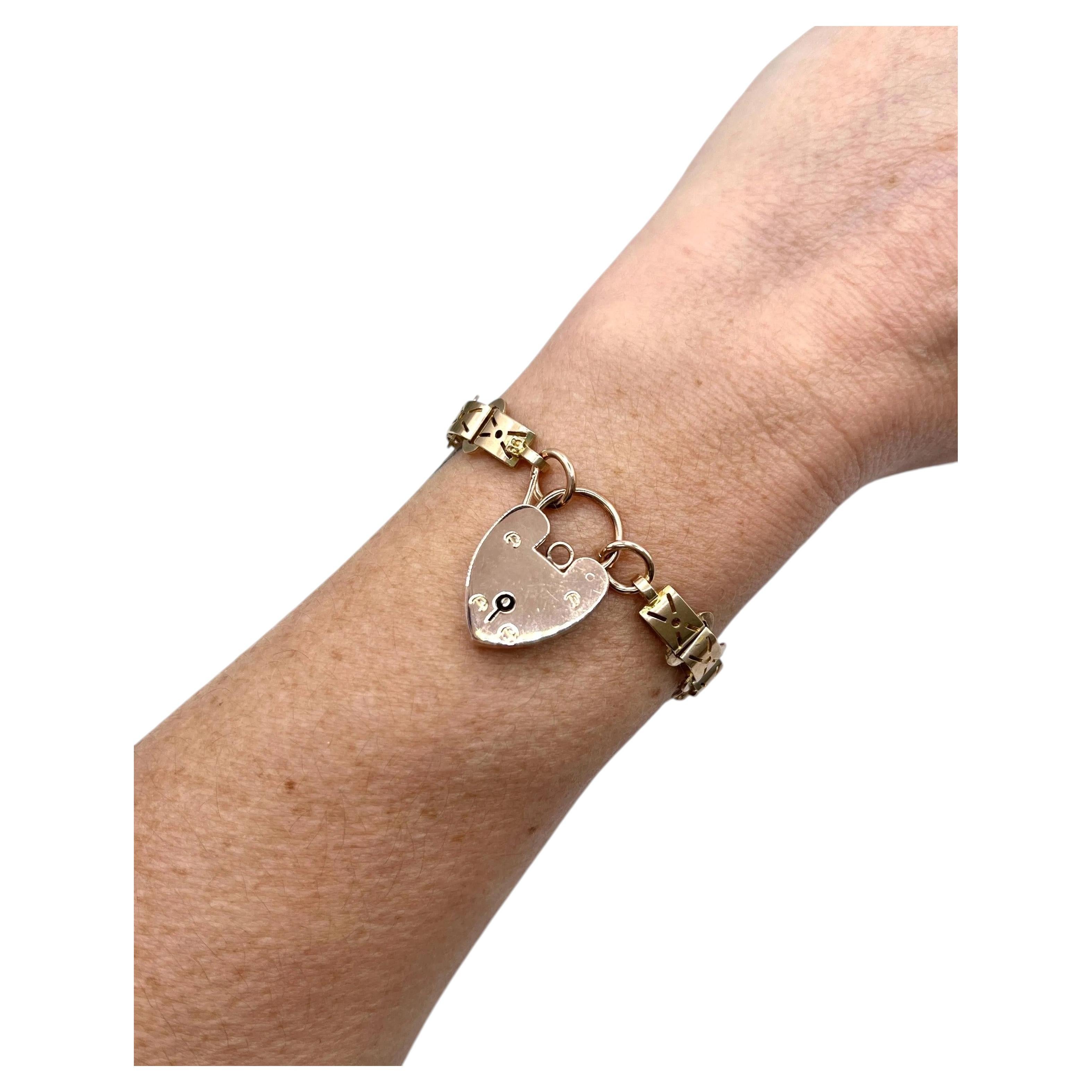 Antikes Armband aus 9-Karat-Gold aus den 1920er Jahren mit ausgefallenen Gliedern und Herz-Vorhängeschlossverschluss