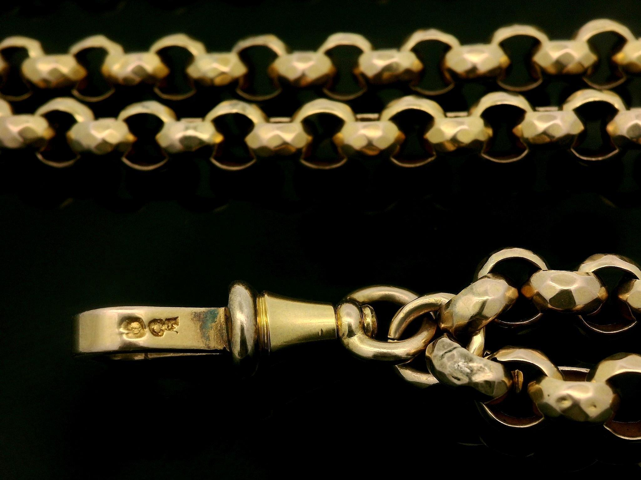Material: Solid 9k Yellow Gold
Weight: 58.24 Grams
Chain Type: Hammered Faceted Wrap Rolo link
Chain Length: 59 Inches
Chain Width: 5.8mm (approx.)
Closure: Dog Clip
Inside Clasp Measurements: 8x5mm
Condition: Antique. 1 Repair spot on one link.