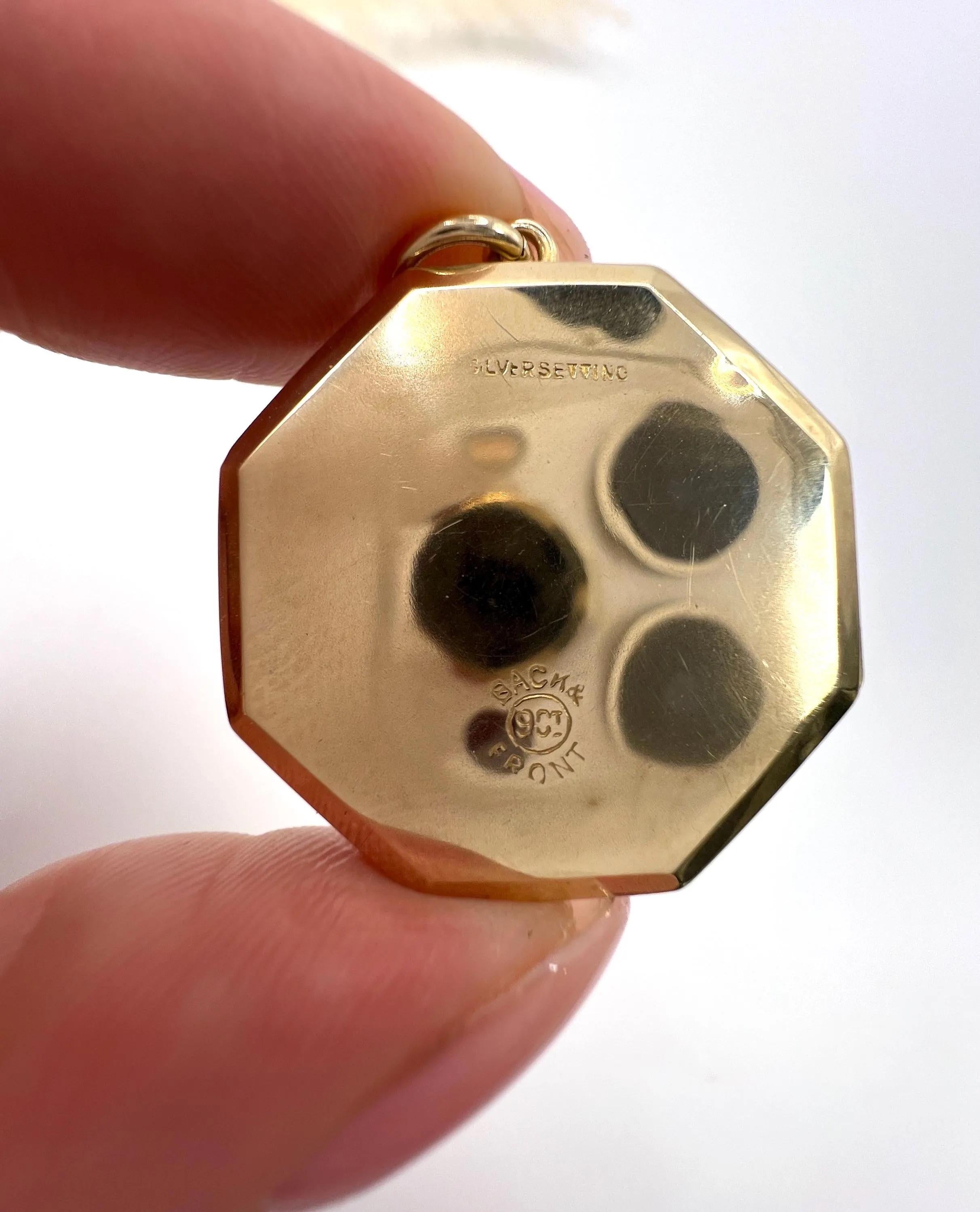 Antiguo relicario eduardiano de oro de 9 ct, estampado en el anverso y reverso, con forma octogonal de golondrina en venta 1