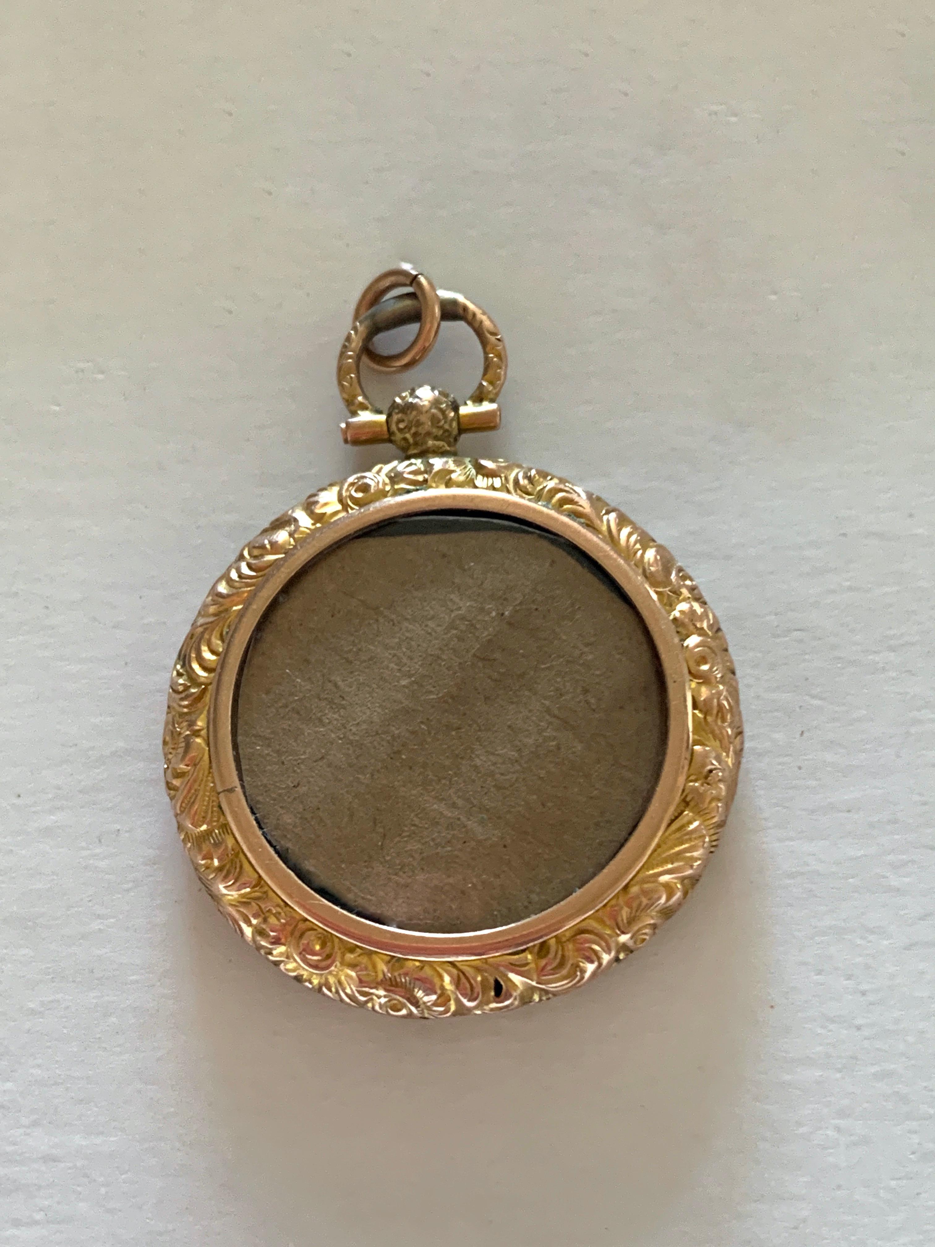 Antique Edwardian 9ct Gold photograph Locket
Fully Hallmarked - Birmingham 1904 9 375
Weight 4.68 grams ( without Inserts )

The locket is holding two perspex windows
hand cut from very fine plastic - modern addition
with a centered piece of