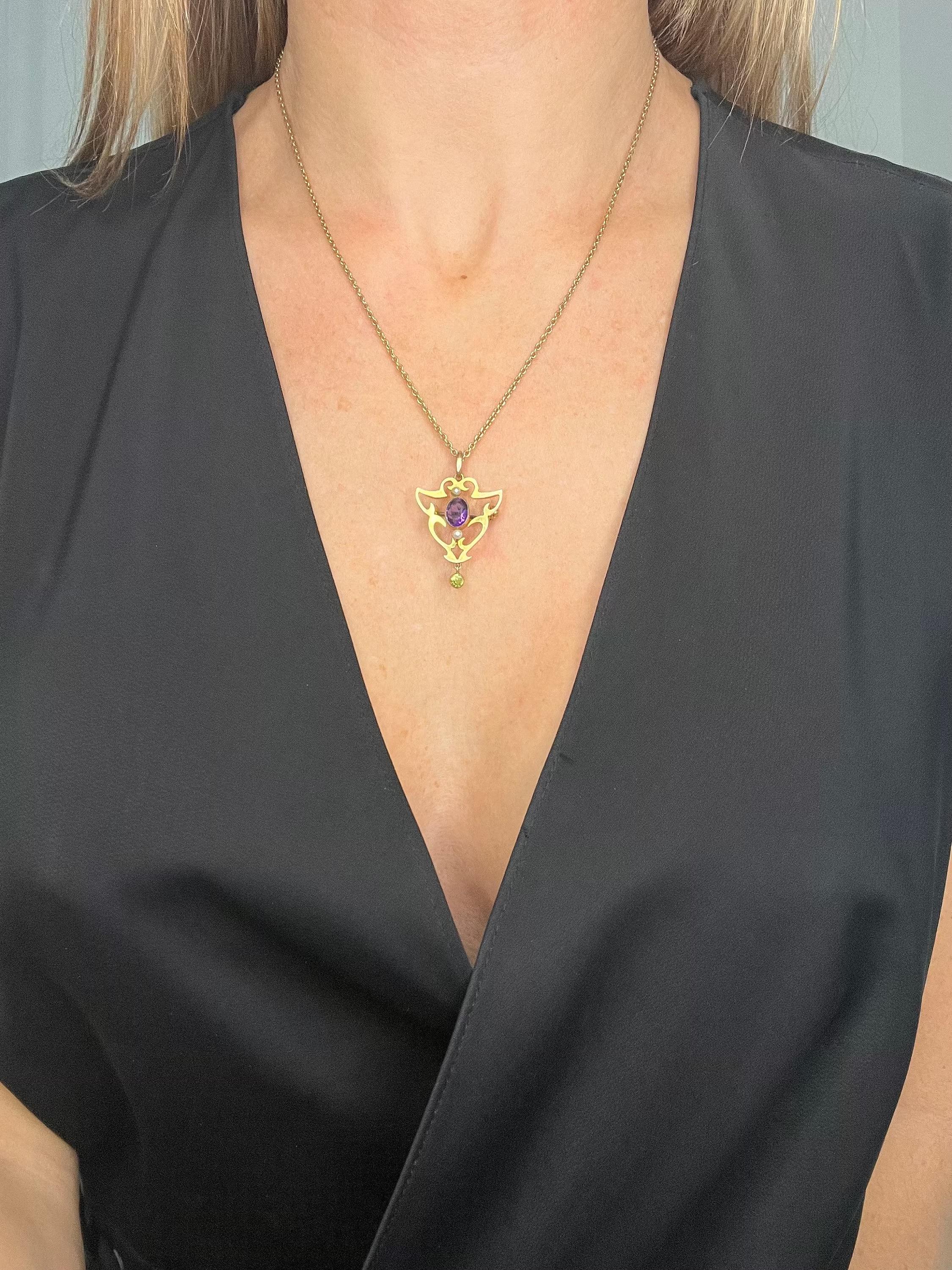 Antique Suffragette Pendant/Brooch 

9ct Gold Tested

Circa 1910 

This 9ct yellow gold suffragette pendant is a stunning piece of jewellery that is sure to turn heads. The pendant features an oval amethyst in the centre and features a natural seed