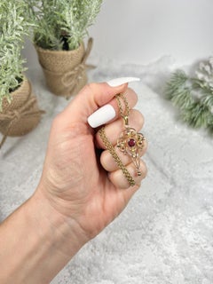 Antique 9ct Gold Edwardian Garnet Pendant Set with a Gold Ball Drop
