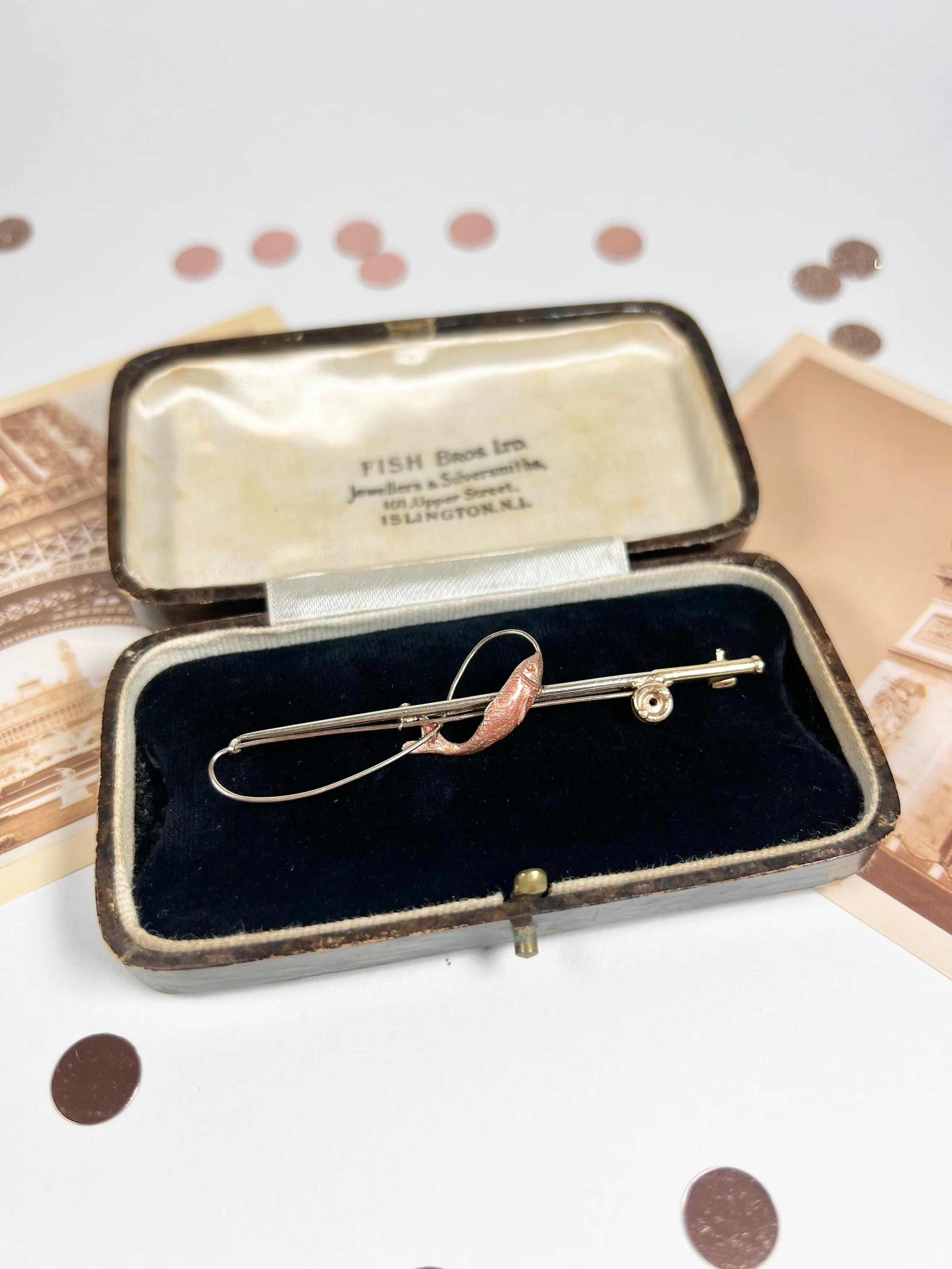 Antique Fishing Rod Brooch

9ct Gold Stamped 

Hallmarked London 1905

Wonderfully crafted, Edwardian gold brooch. Featuring an enamel fish caught on a golden fishing line. 
This would make a lovely gift for any fishing fanatic! 

Measures approx