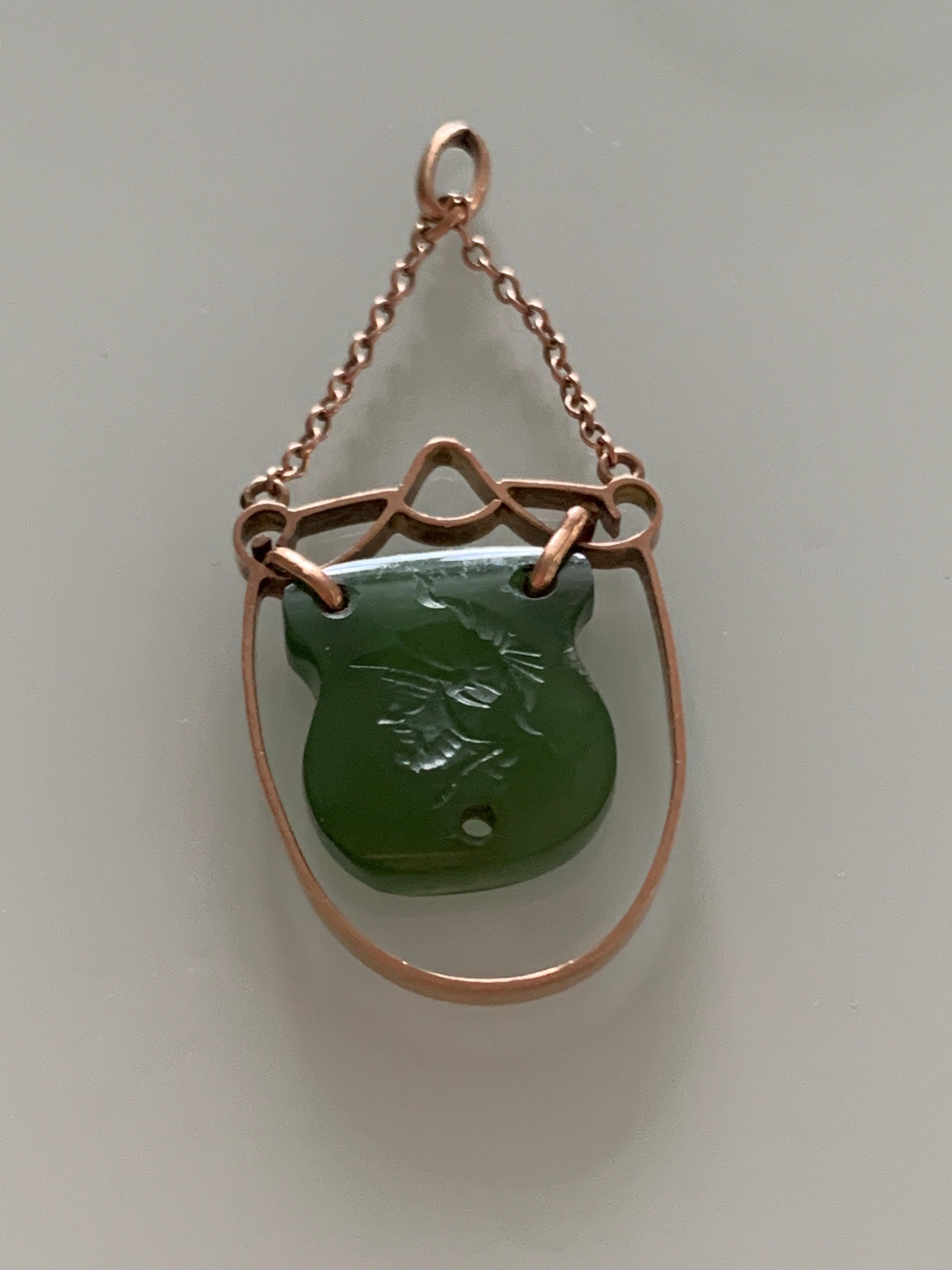 Antique - Victorian Era - Circa 1800s
9ct Rose Gold swing Mounted Centurion etched Shield jade medallion
Condition :
very good - there is a drilled hole in the jade so definitely something 
was strung through this - unsure what it was - so selling