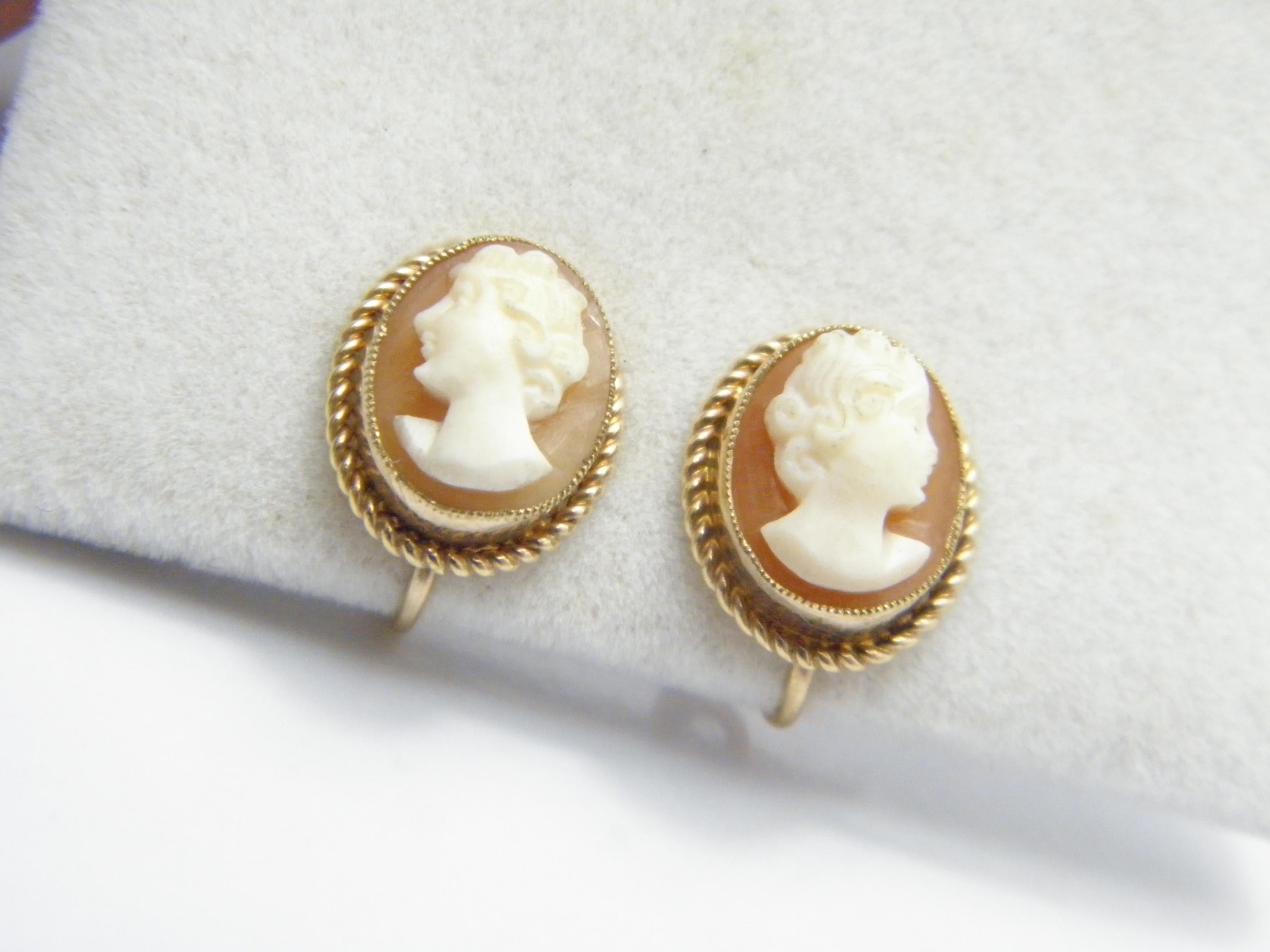 A very special item for you to consider:

9CT GOLD LARGE SHELL CAMEO SCREW BACK STUD EARRINGS

DETAILS
Material: 375/1000 9ct Solid Gold
Style: Classic Cameo earrings with hand carved Conch shell of lady in relief
Gemstones: Orange and white hand