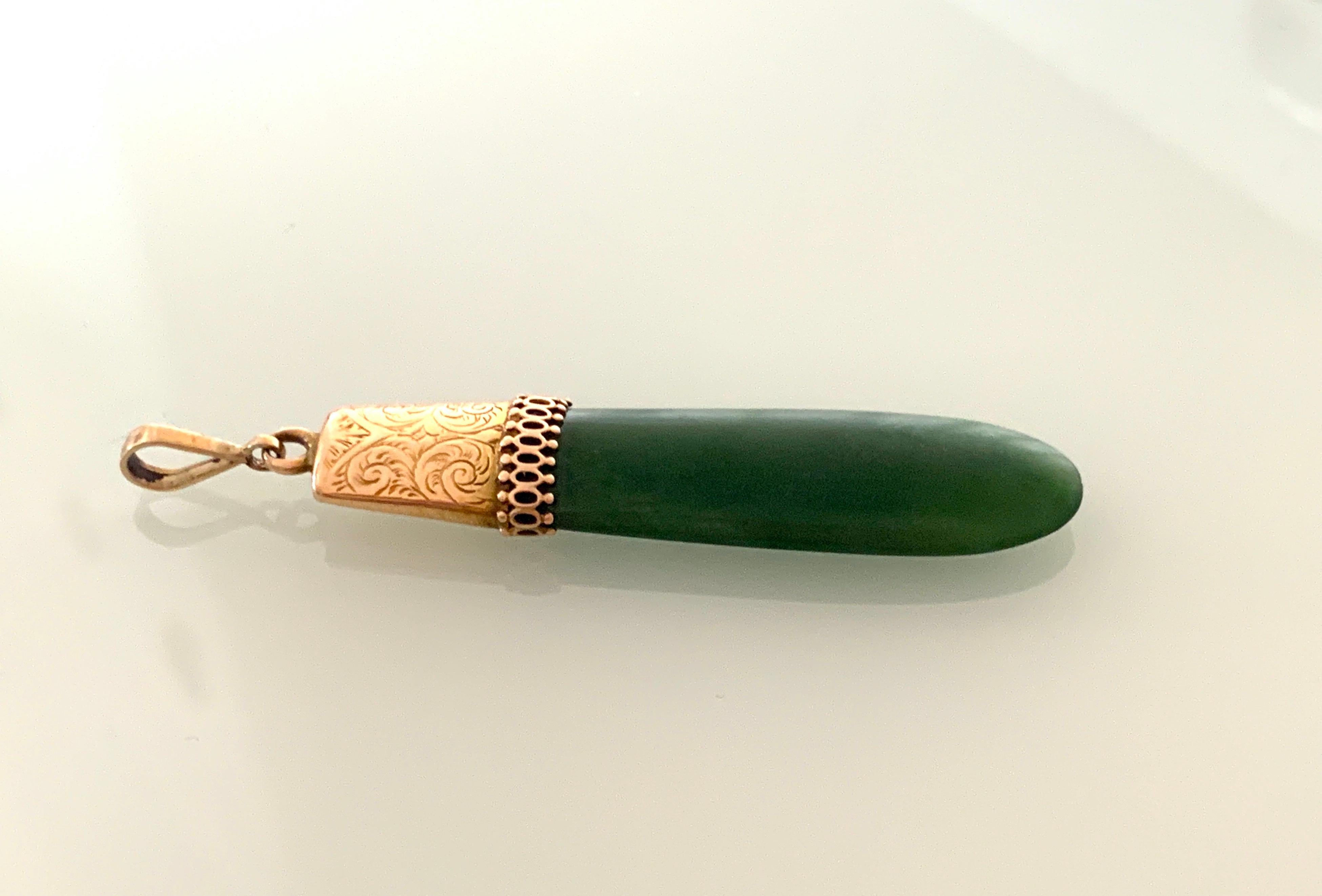 Antique 9ct Gold Jade Pendant 
With Beautiful 9ct Gold engraved mount with decorative edge.
Victorian Era Circa 1800s.