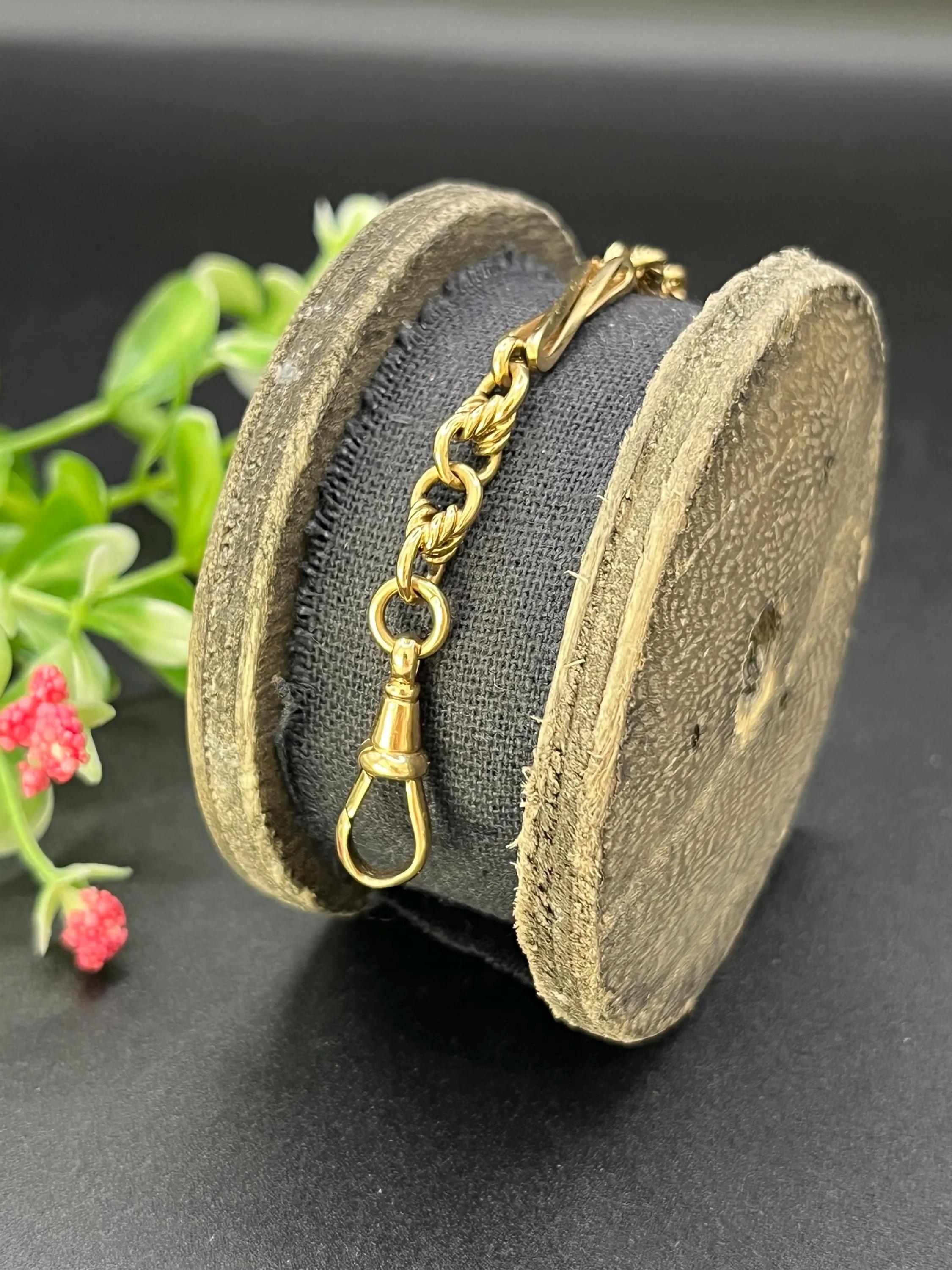Femenino o masculino Pulsera de eslabones de fantasía eduardiana, antigua, estampada en oro de 9 ct, con cierre de clip giratorio en venta