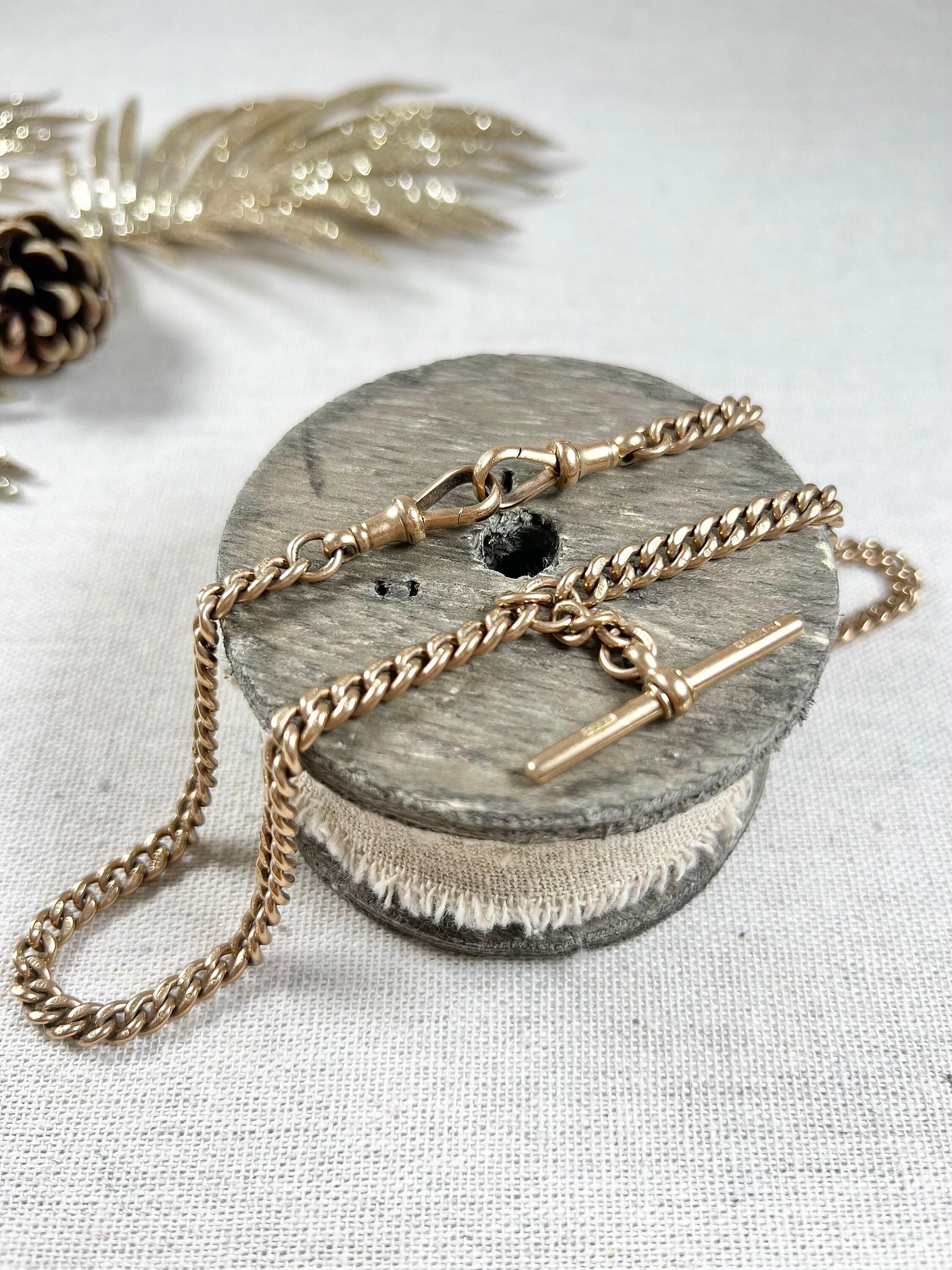 Antique Albert Chain

9ct Rose Gold Stamped 

Circa 1910

Makers Mark J G & S (John Grinsell & Son)

This beautiful Edwardian Albert watch chain necklace is crafted from 9ct rose gold and features a classic curb link design. All of the links are