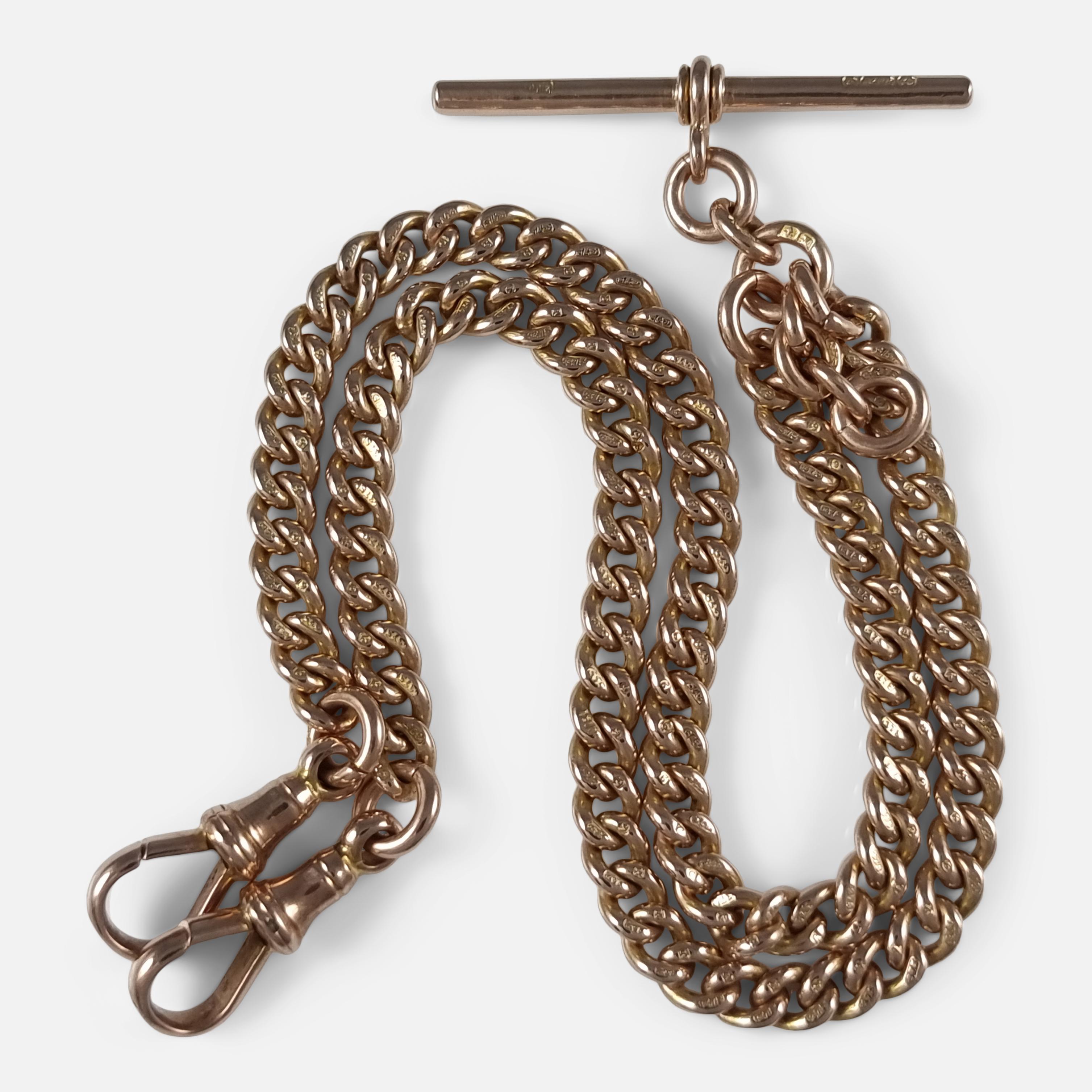 Showcasing a curb link design, the antique 9ct mellow rose gold double Albert watch chain from 1922 bears Birmingham assay office marks, attesting to its authenticity and quality.

• Measurements: Total length is 15 11/16 inches (39.9 cm) end to