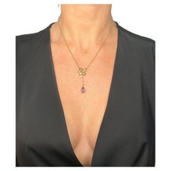 Antiguo colgante de oro rosa de 9 ct, eduardiano con arco de amatista y perlas semilla