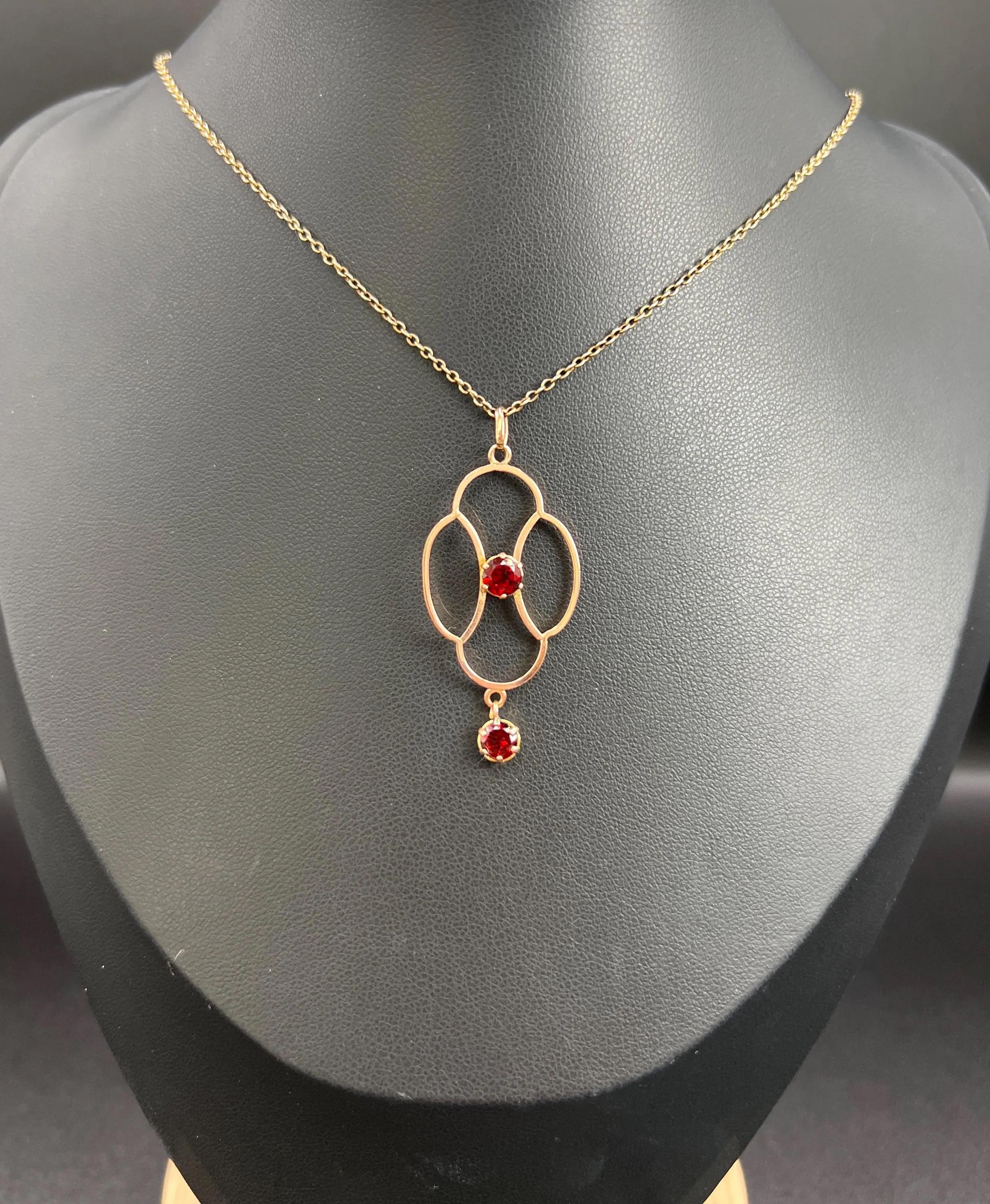 Antique Garnet Pendant 

9ct Rose Gold

Circa 1910

* THE CHAIN IS SOLD SEPARATELY 

Step back in time with this exquisite Edwardian-era open-work pendant, beautifully crafted in 9ct rose gold. This stunning piece features a captivating, almost