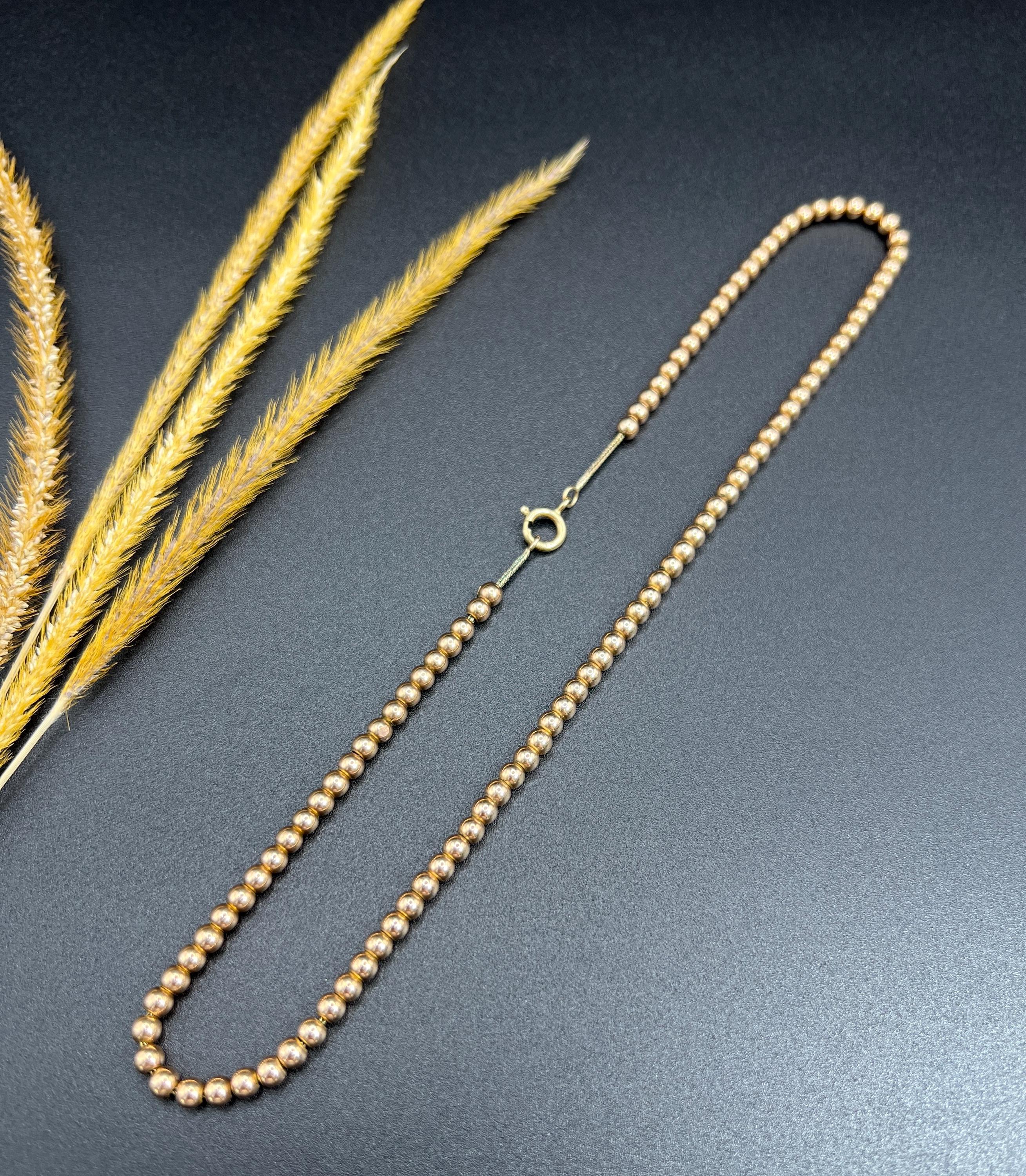 Antike Kugel-Halskette aus Marseille 

9-Karat-Gold

CIRCA 1910

Diese wunderschöne Halskette, die als 