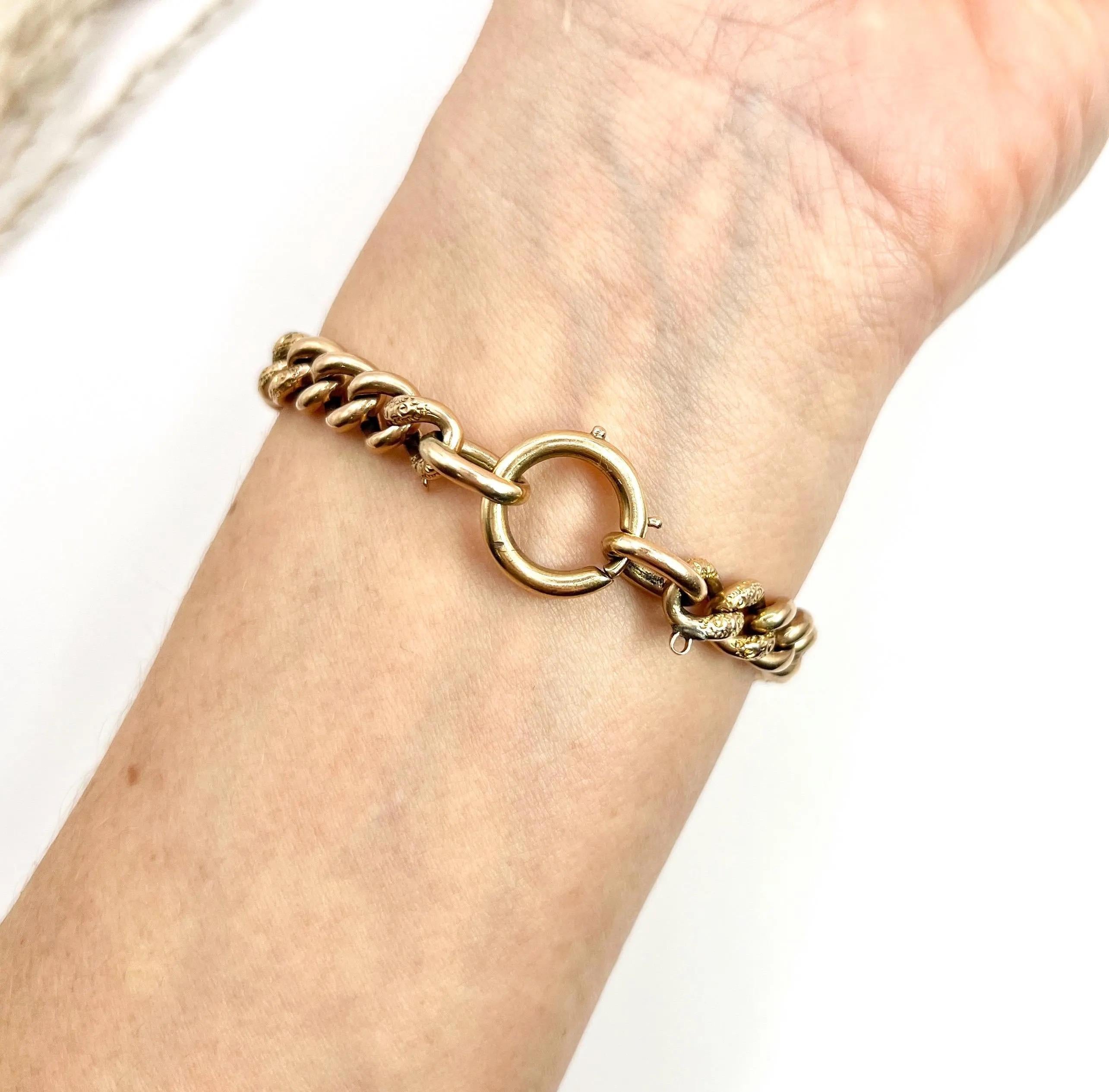 Antique Curb Bracelet 

9ct Rose Gold Stamped 

Circa 1900

This stunning Edwardian curb bracelet radiates beauty and elegance. Crafted from 9ct rose gold, it features a unique 