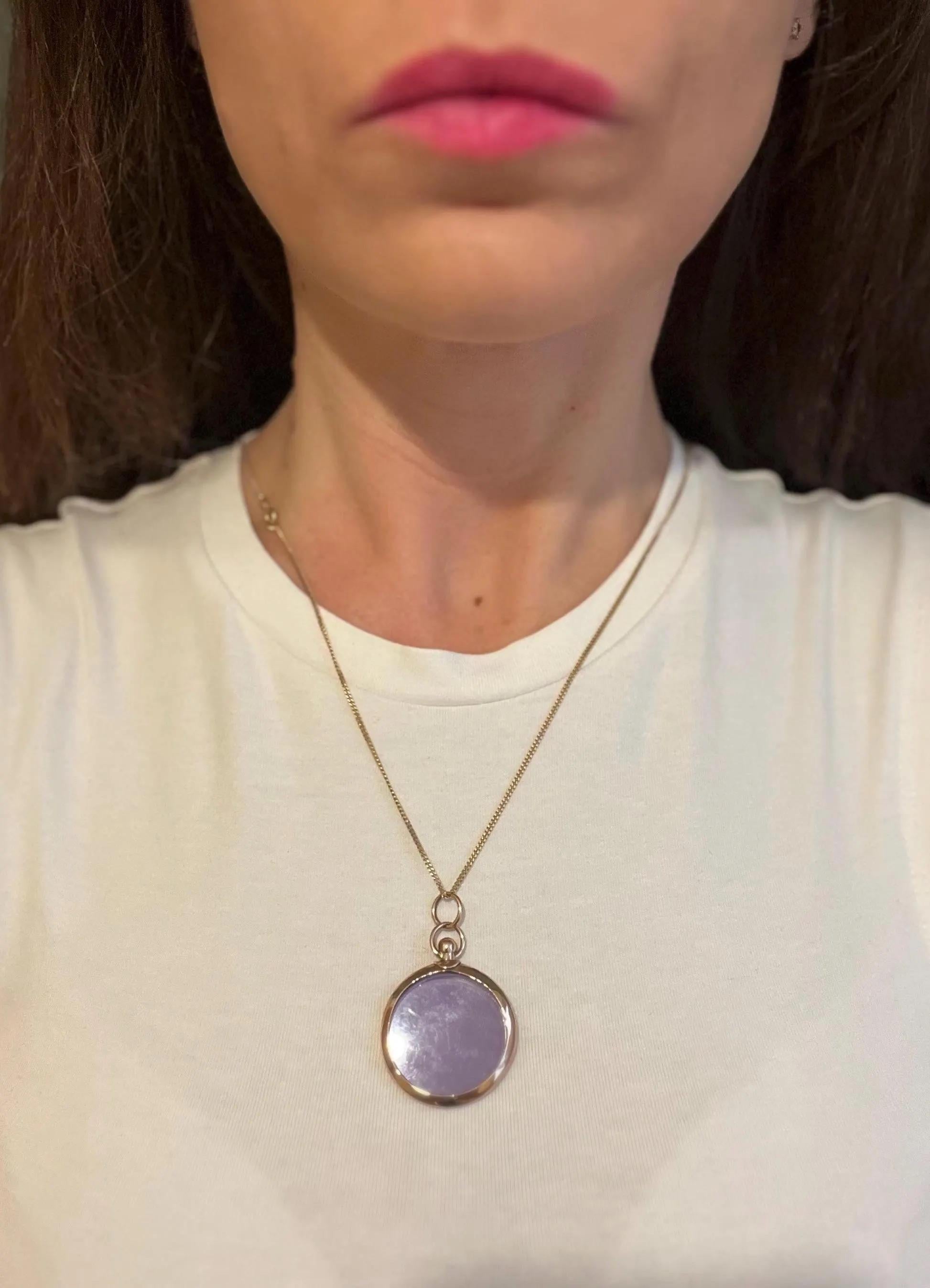Antique Double Sided Glass Locket Pendant 

9ct Rose Gold

Circa 1900

Makers Mark WJP

*The chain is sold separately

Antique 9ct rose gold locket. Double-sided glass design with a screw-top bail that opens to hold one or two photos back-to-back. A