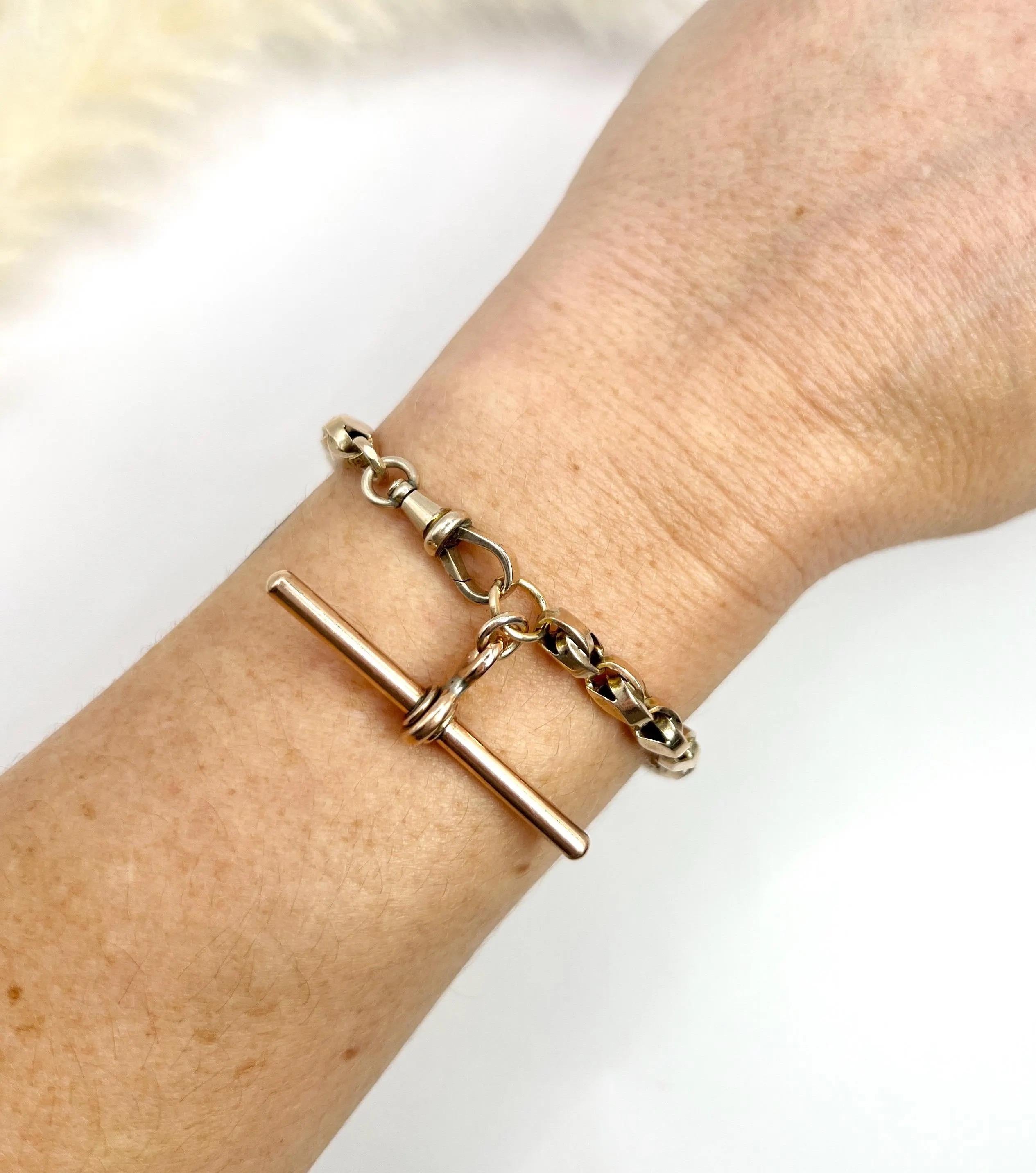 Antique Tulip Link Bracelet 

9ct Rose Gold Stamped

Circa 1900

Makers Mark K C 

Step back in time with this exquisite Edwardian-era Albert-style bracelet, crafted from stunning 9ct rose gold. The bracelet features elegantly designed 5mm wide