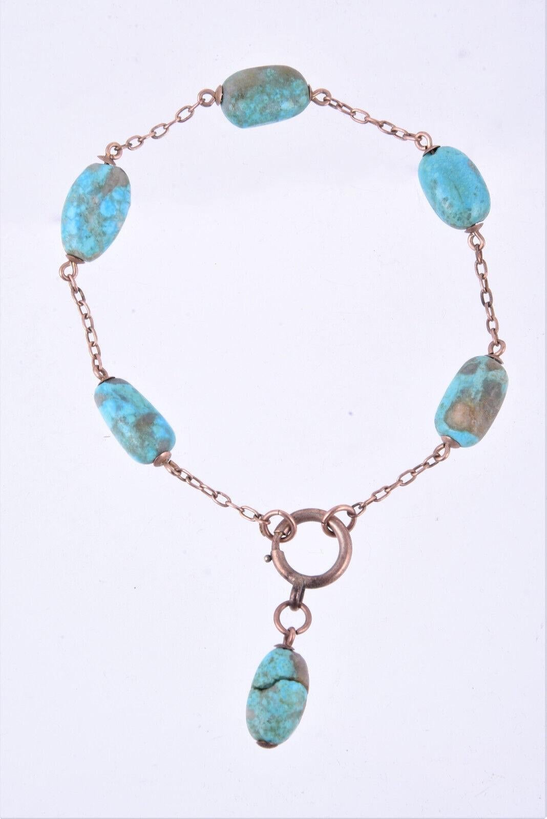 9ct Rose Gold Antique Art Deco
Natural Turquoise Stone Nugget beaded Bracelet
Length 8'
Bead size 15mm x 9mm
Weight 9.73 grammes
with a 9c plaque near clasp.
The swinging bead is in to section - and twists as two parts

