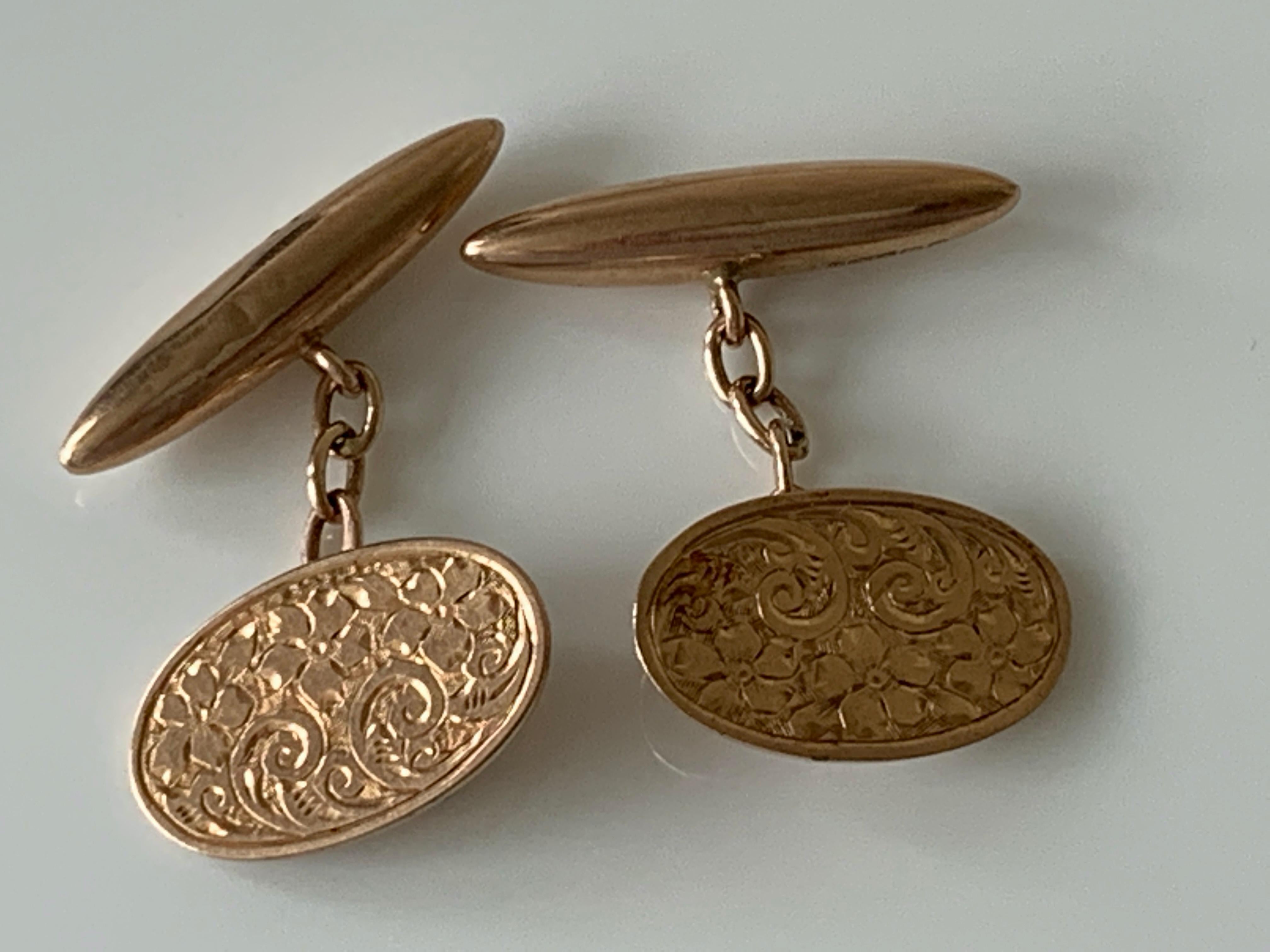 Antique Rose Gold Cufflinks 
with Engraved Foliage Front decoration
torpedo backs have hallmarks 
one set is very faded the other very clear
-Birmingham 1886
also the chains are hallmarked 9 375 