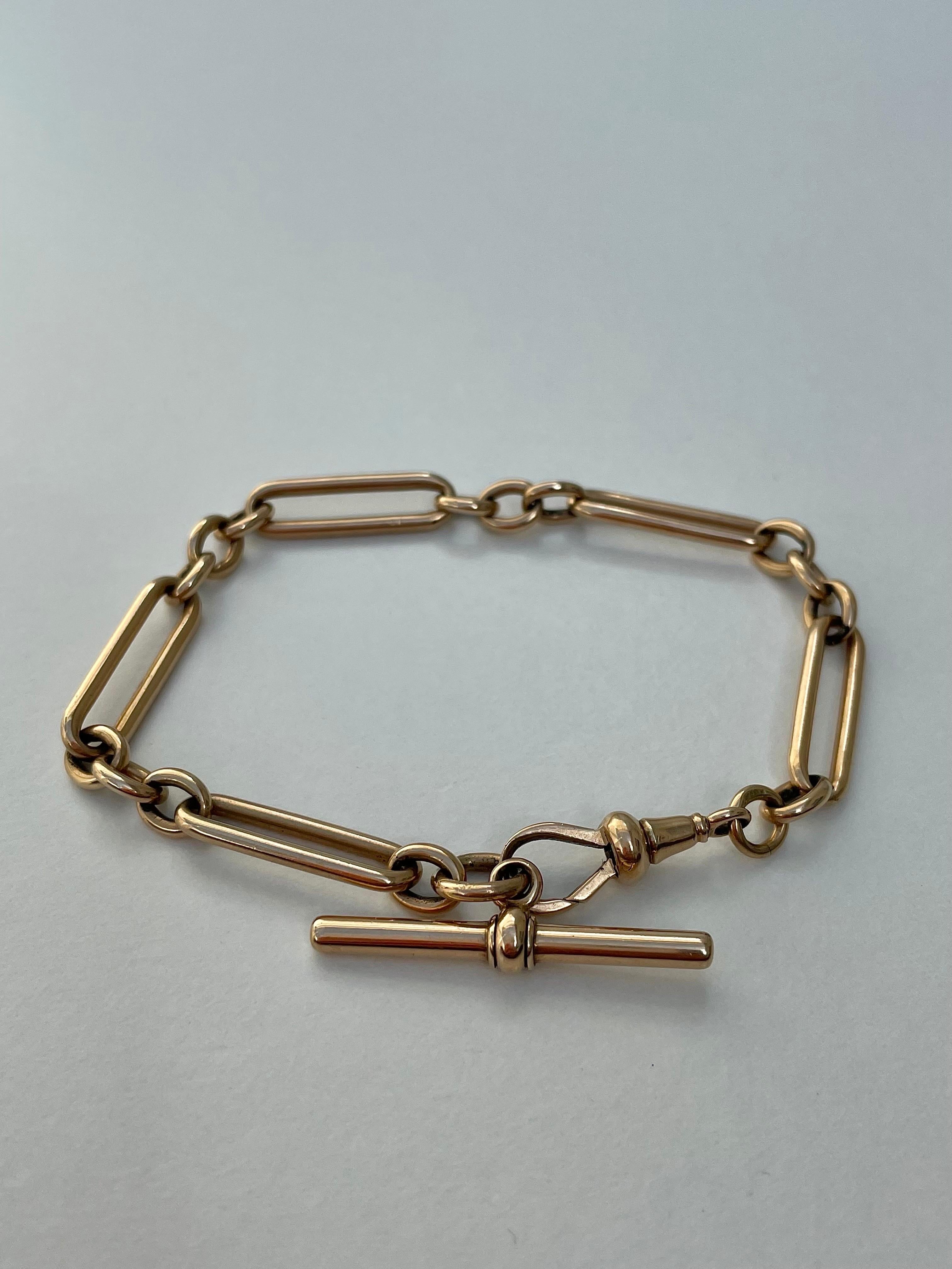 Antique 9ct Trombone Link Bracelet with TBar and dog clip 

beautiful and classic link bracelet, everyday wear! 

The item comes without the box in the photos but will be presented in a gift box

Measurements: weight 21g, length 21.5cm, width