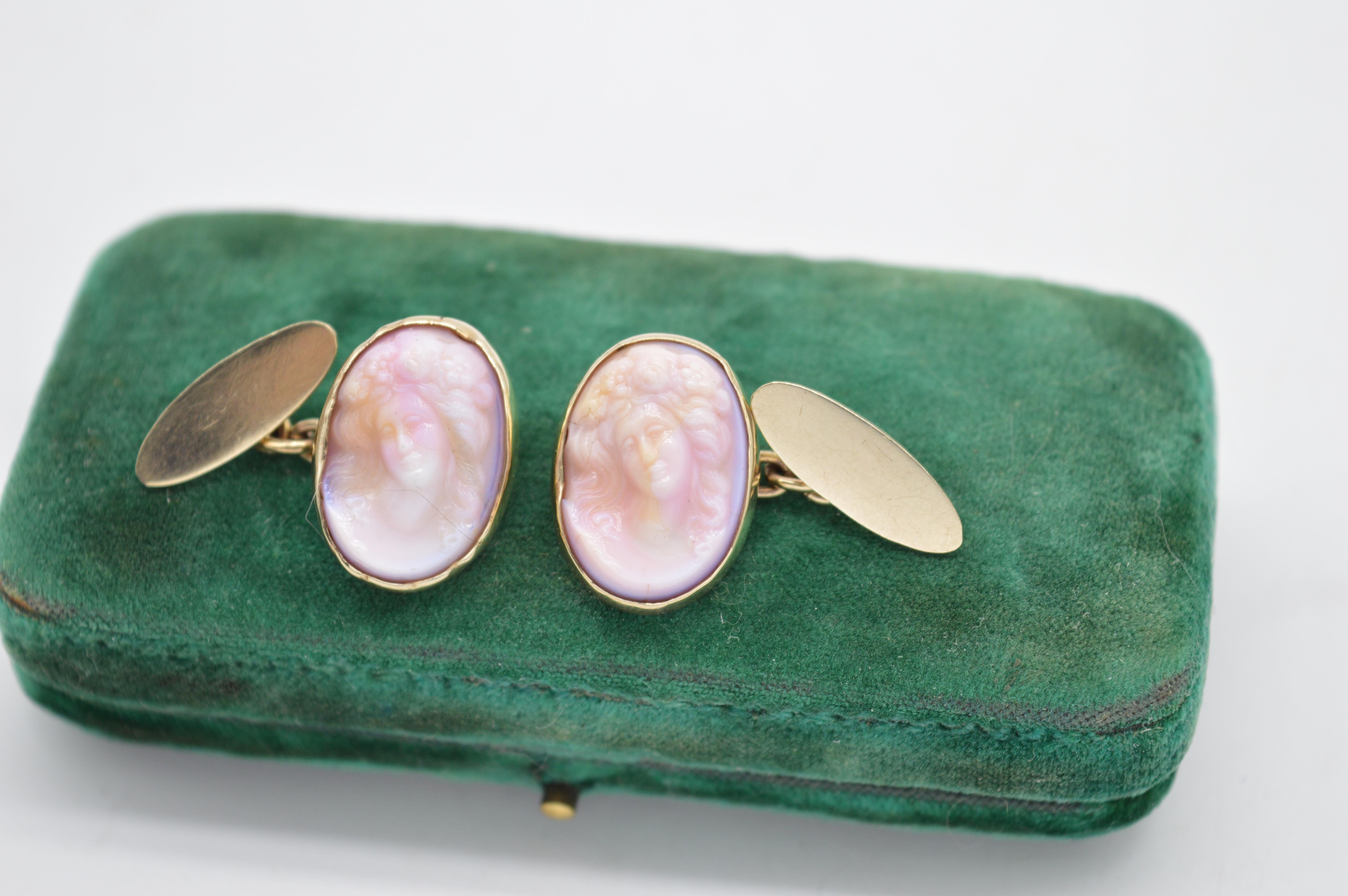 This antique pair of 9ct gold cufflinks features a perfectly carved cameo of the Greek goddess Aphrodite.

The cameos are perfectly matched both in carving and colour, clearly displaying the craftsman's immense skill.

Likely Victorian, these
