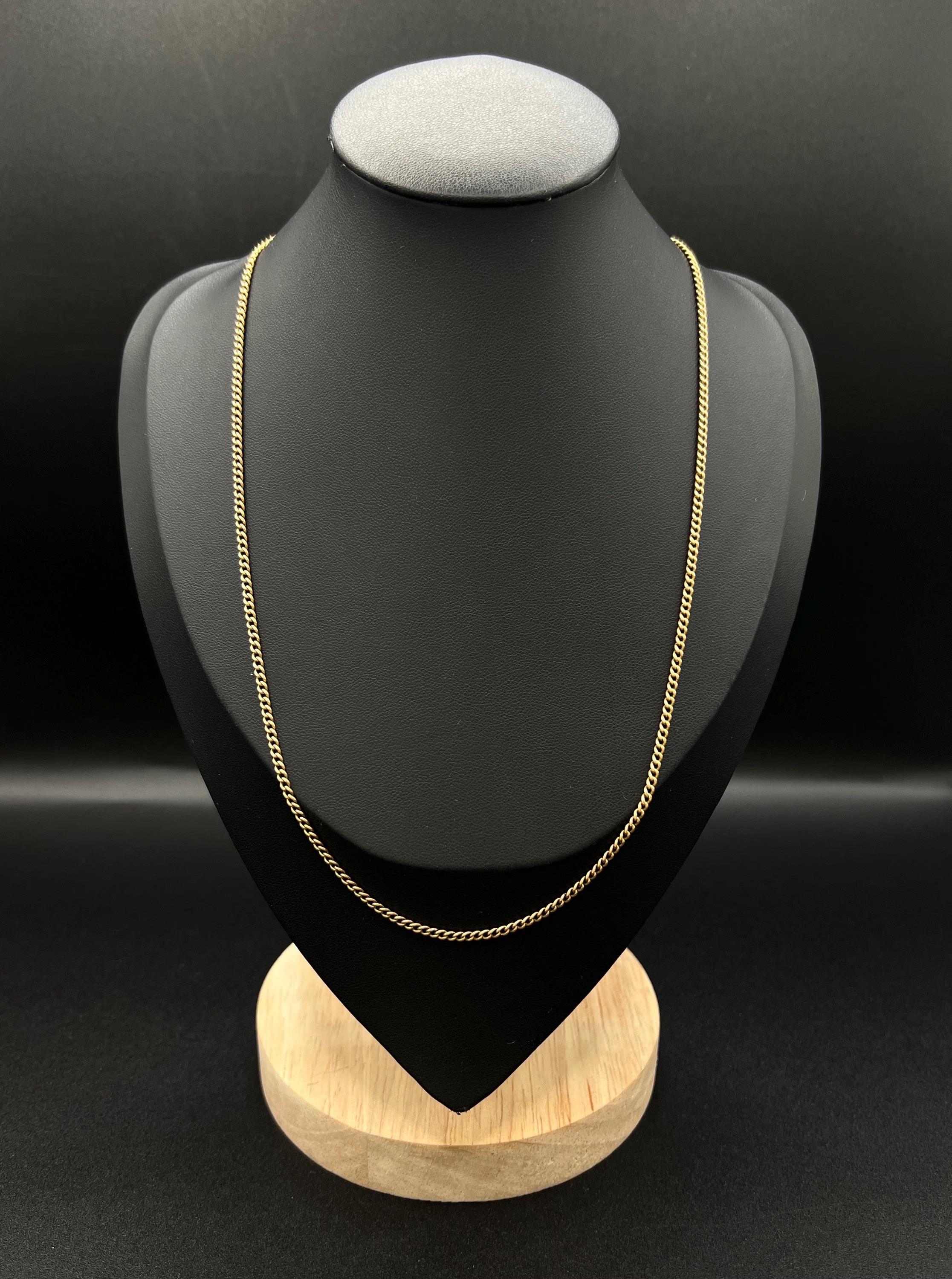 Antique Fine Curb Chain

9ct Yellow Gold

Circa 1900

This stunning Edwardian-era curb link chain is crafted from 9ct yellow gold, which has been thoroughly tested to ensure its authenticity. The antique fine curb chain is beautifully designed,