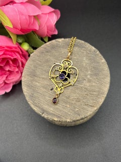 Pendentif et chaîne anciens en or jaune 9ct, grenat, perles de rocaille et améthyste de style édouardien