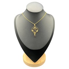 Pendentif et chaîne anciens en or jaune 9ct, grenat, perles de rocaille et améthyste de style édouardien