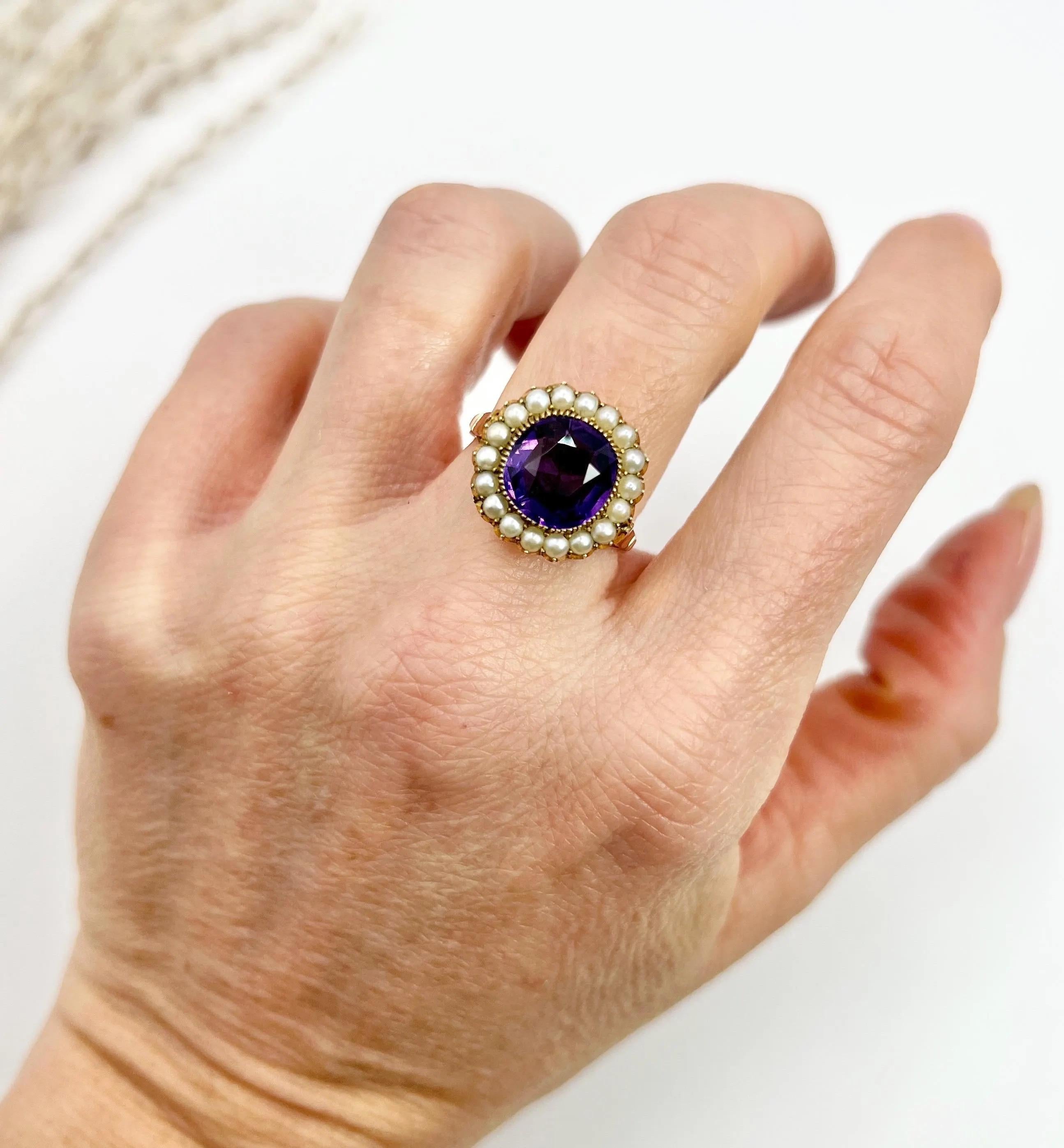 Antique Amethyst Ring

9ct Gold

Circa 1910

Introducing a stunning Edwardian-era ring crafted in 9ct gold, this exquisite piece showcases a captivating cluster design. At its heart lies a beautifully faceted amethyst stone, radiating elegance and