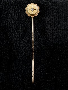 Antique 9k gold and diamond stick pin, Gypsy set, star