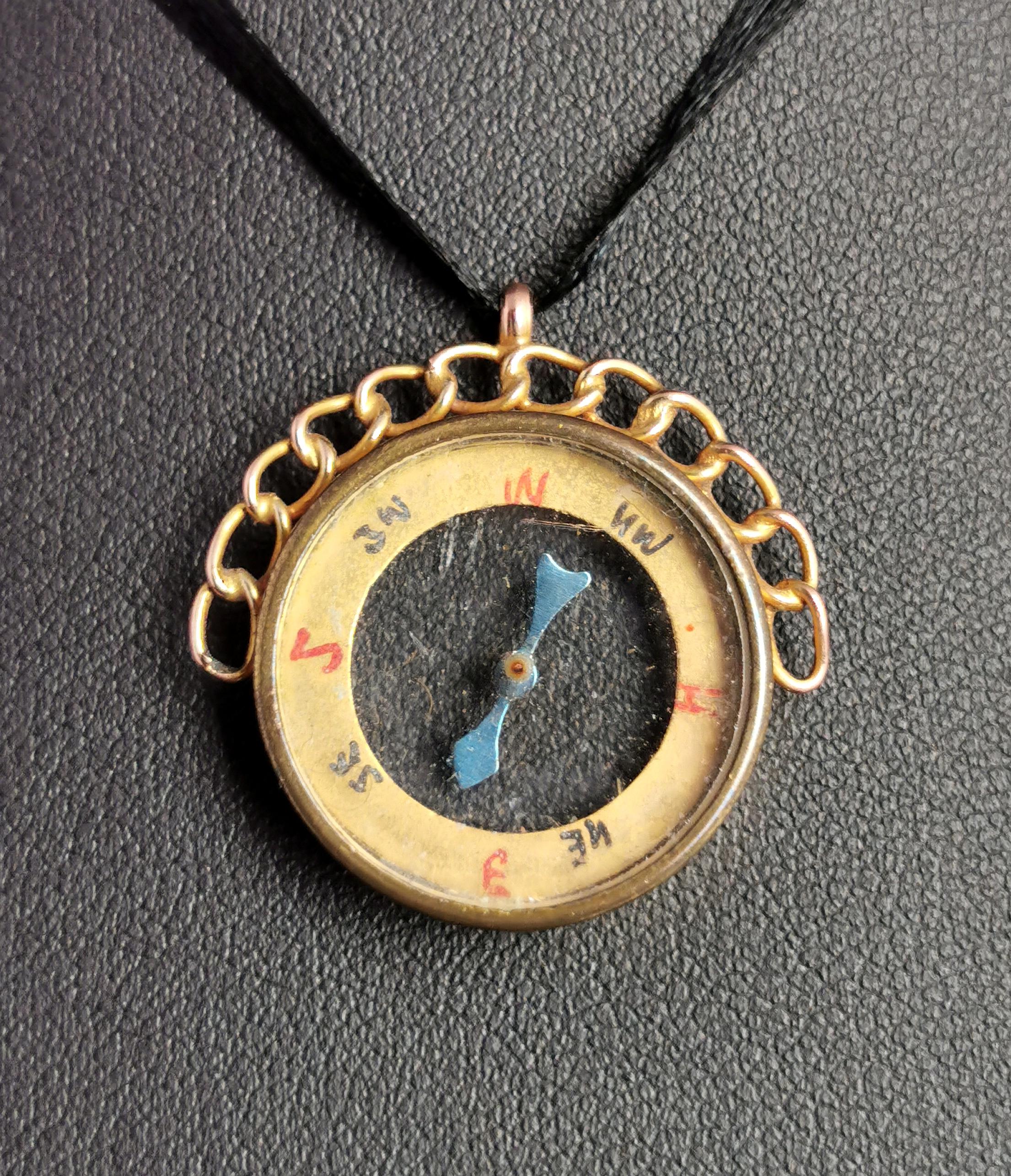 A beautiful antique 9kt gold compass pendant or fob.

It has a whimsical and mystical feel to it with the real working compass encased within the original glass.

The compass appears to be in working order though I can't guarantee it's accuracy, it