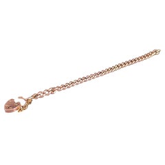 Antique 9k gold curb link bracelet, Heart padlock