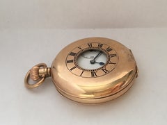 Antique 9 Karat Gold Dennison Case Half Hunter Pocket Watch