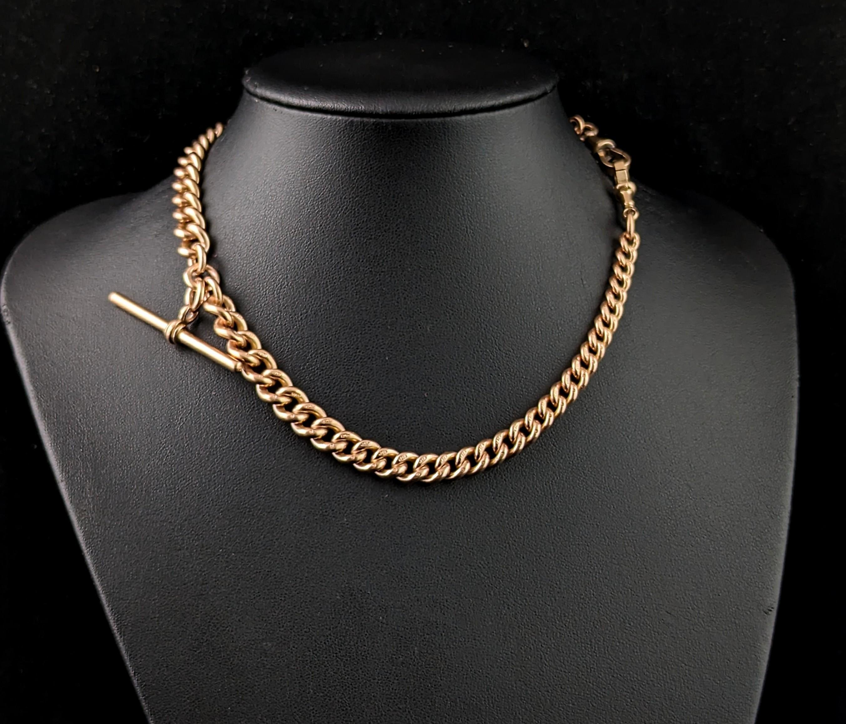 You are sure to be charmed by this handsome antique Edwardian era 9ct gold Albert chain.

It is a curb link chain in rich antique 9ct gold with both rosey and yellow gold tones, each link individually stamped for 9ct gold, 9.375.

A double Albert