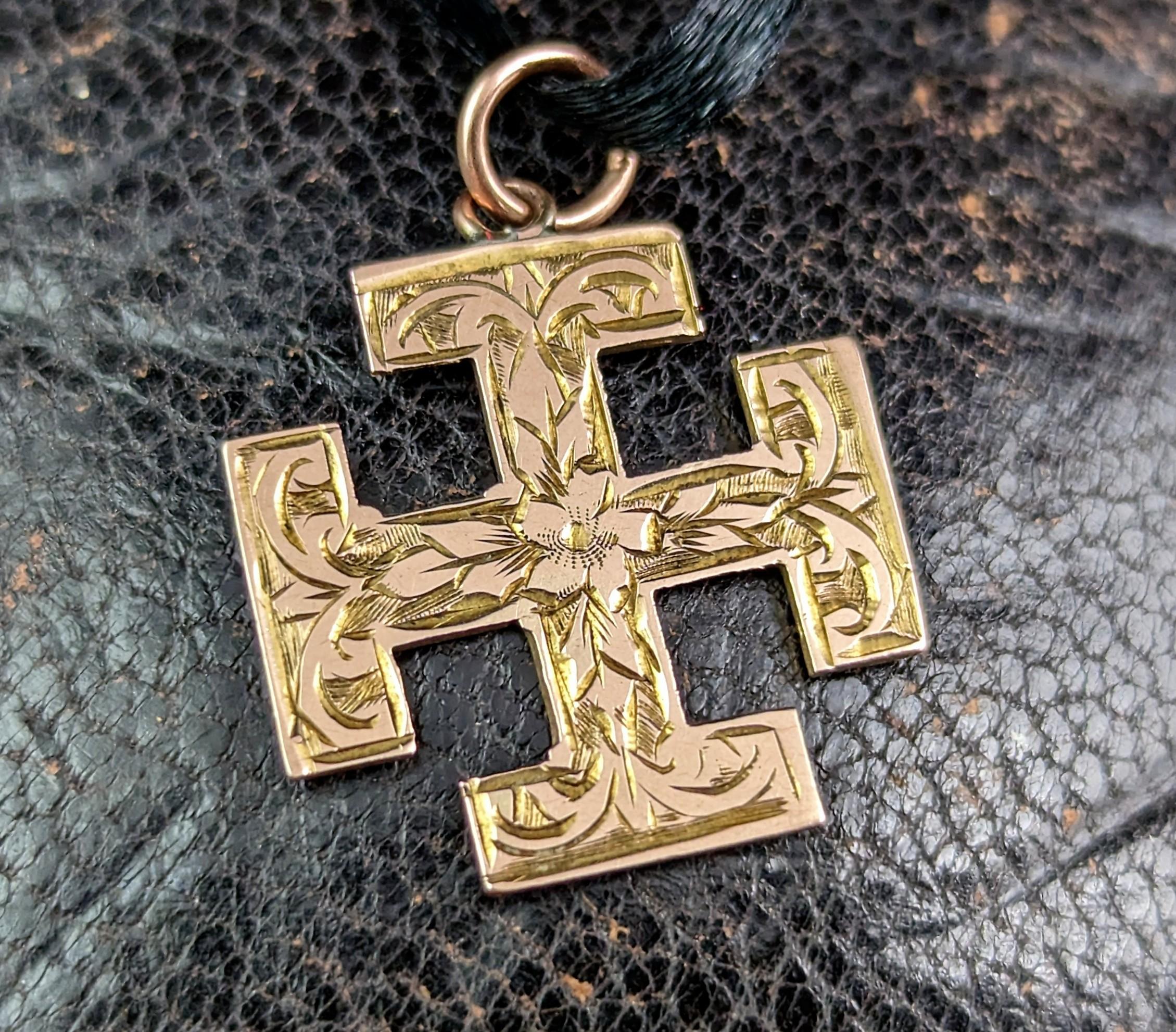 This sweet antique, 9ct gold Jerusalem Cross pendant is truly unique being hand cut by master jewellers from the past.

A scarcely seen design for a pendant the Jerusalem Cross also known as the five fold cross is a revered and historical cross, a