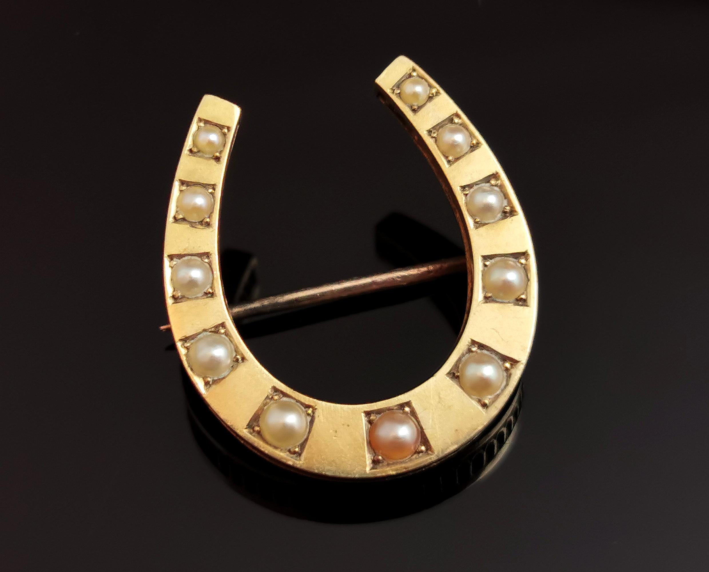 A gorgeous little antique, Victorian 9ct gold and split pearl lucky horseshoe brooch.

The horseshoe has for centuries been used in jewellery as a symbol of good luck and featured heavily in Victorian jewellery, the Victorian era saw a great surge