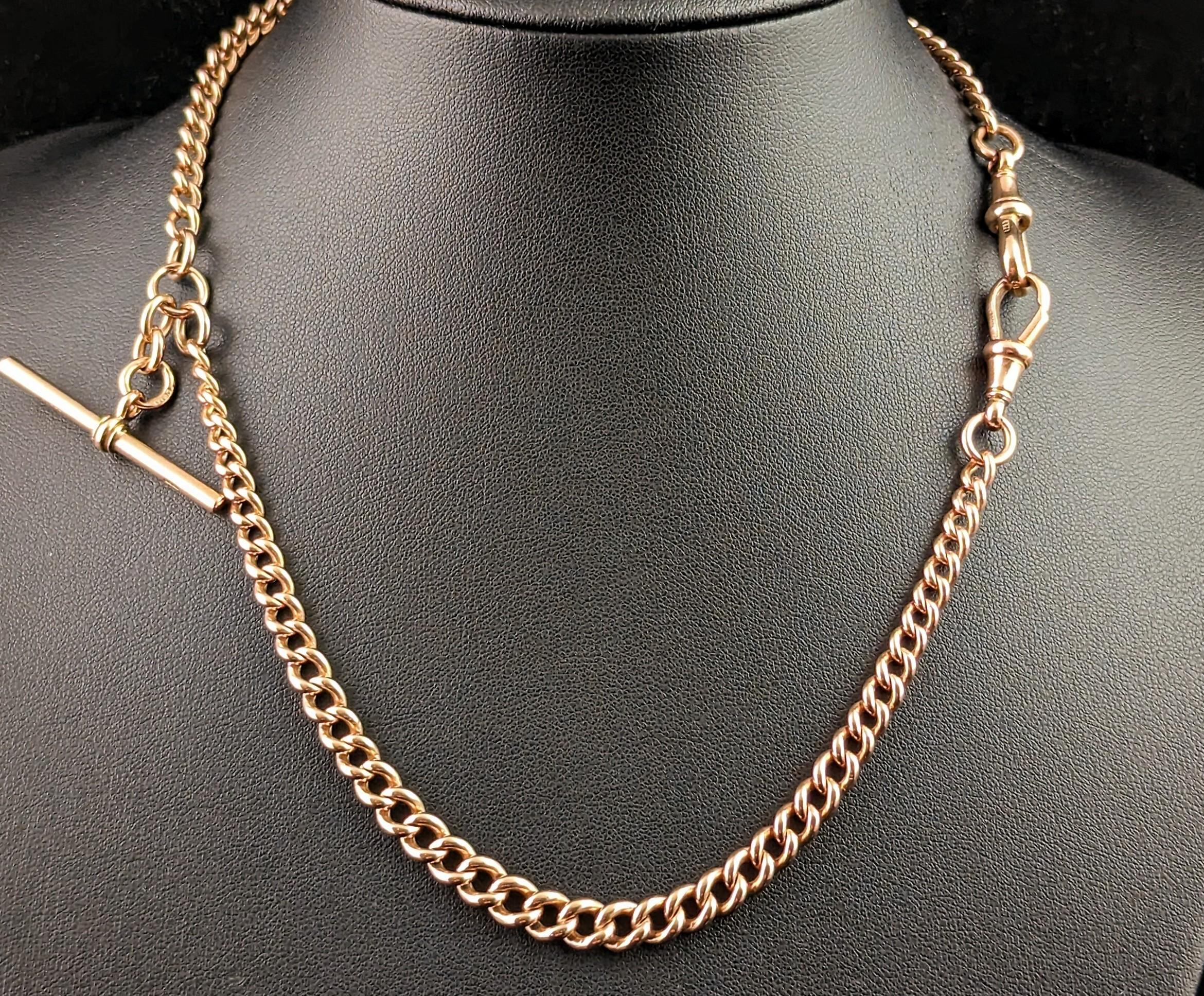 Oh this is such a handsome antique 9kt Rose gold Albert chain!

We love a good Albert chain here at StolenAttic and this beauty is no exception, lovely rich old gold tones, a nice heavy weight, a good wearable length.

It is a curb link chain in 9kt