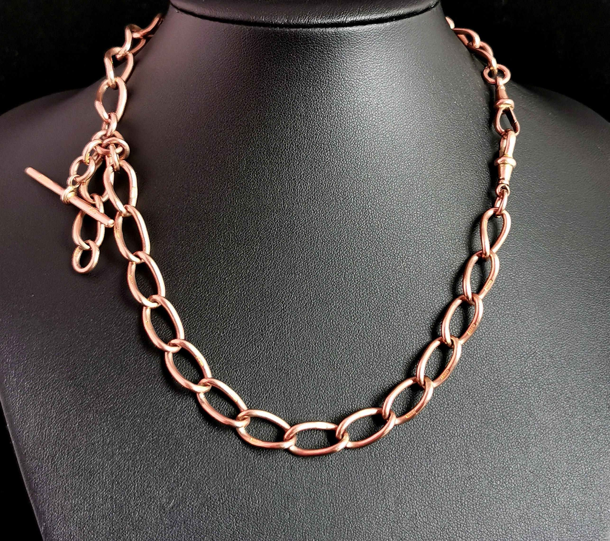 A gorgeous antique 9kt Rose gold Albert chain or watch chain.

It has beautiful elongated curb links with a light rosey overtone, each individually stamped for 9kt gold, these stretched curb links make for a wonderful design.

The rose tone is