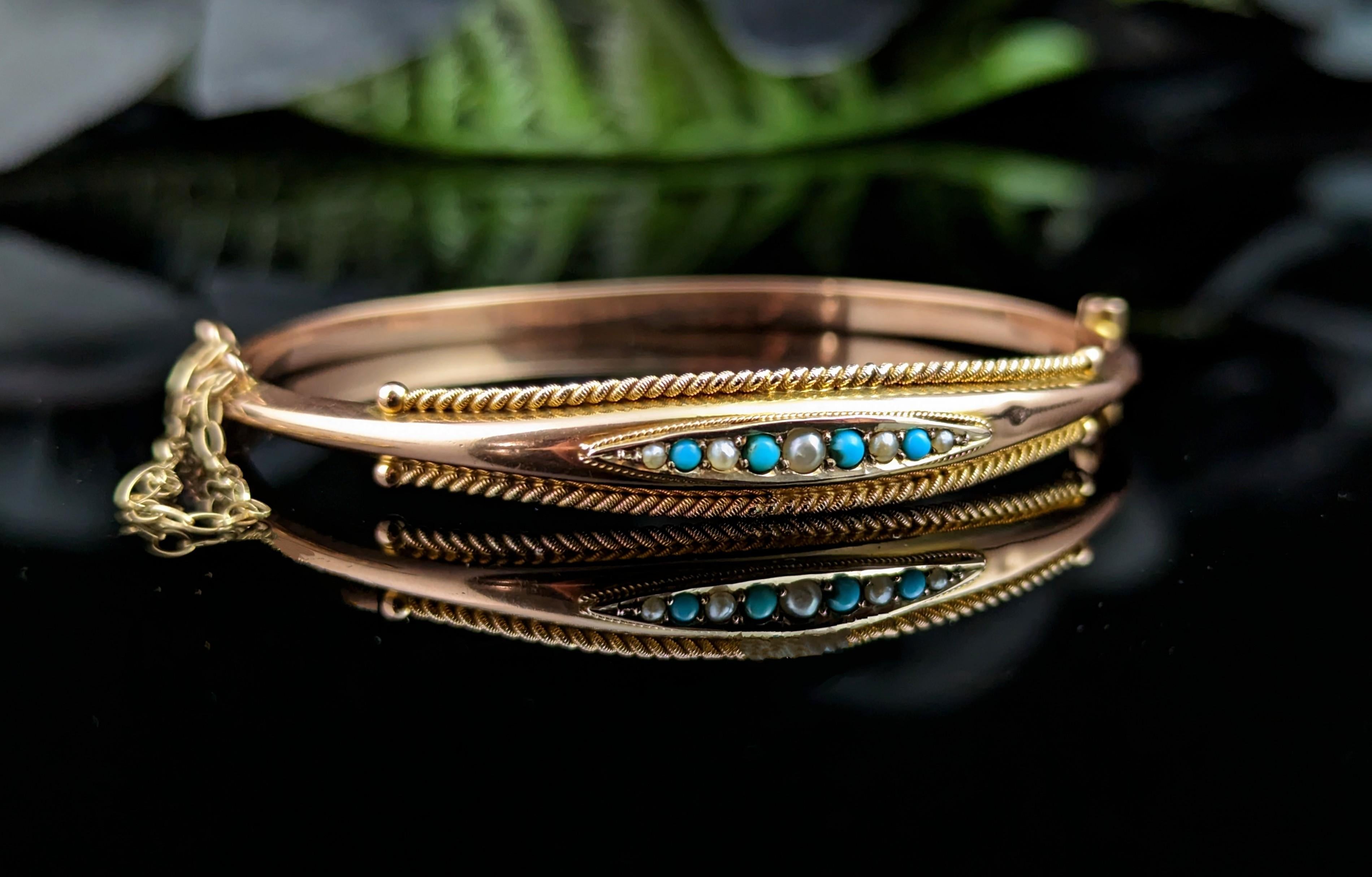We love a good antique bangle here and this Beautiful Victorian 9kt Rose gold, Turquoise and pearl bangle is no exception.

It has a gorgeous classic design, a slim rose gold band with an elongated ellipse shaped face set with turquoise and seed