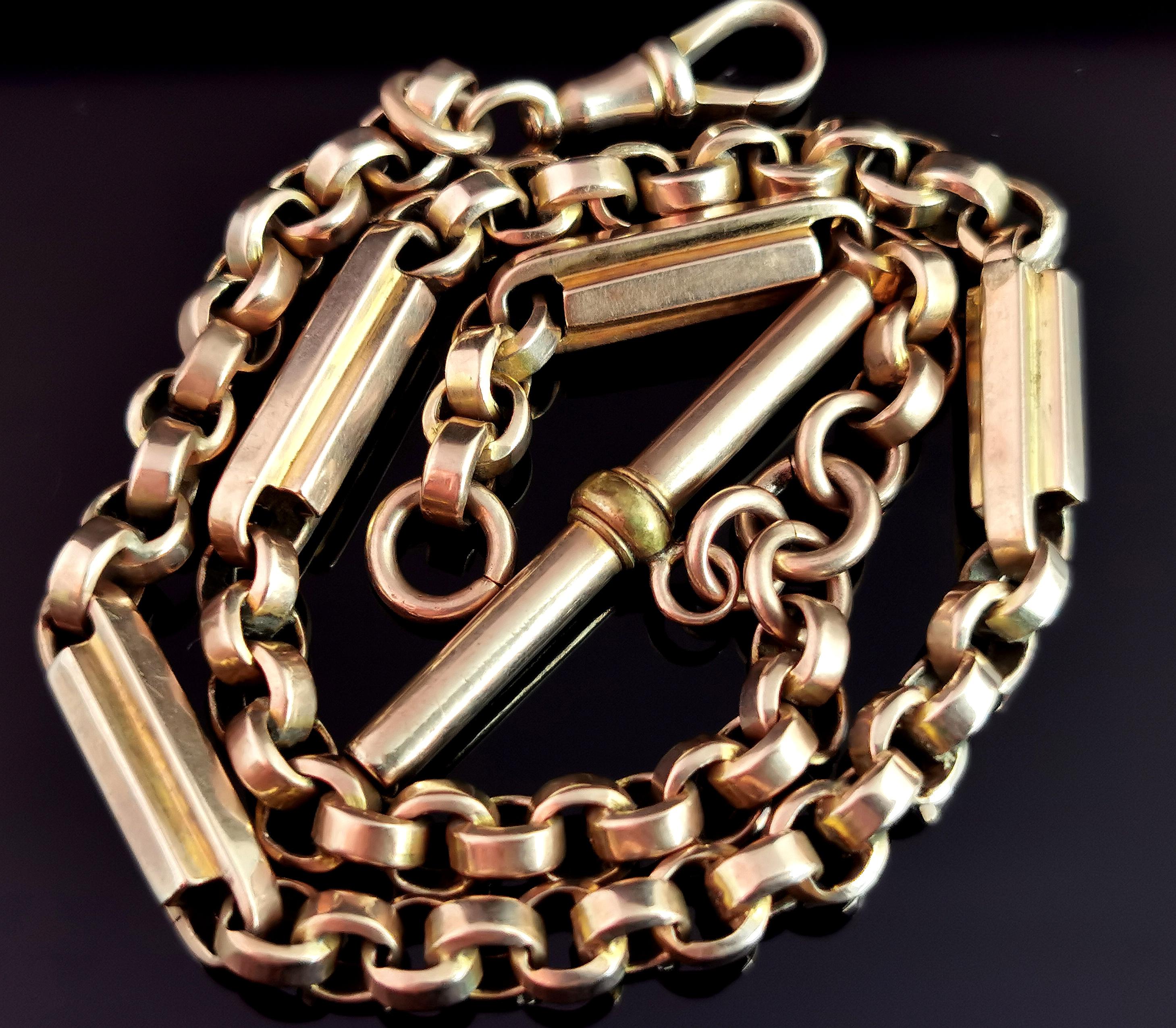 An impeccable antique Victorian era 9kt yellow gold Albert chain or watch chain.

This Albert is a single Albert chain crafted with special bar links connected by chunky rolo links.

It has a dog clip fastener to one end a spring ring to the other,