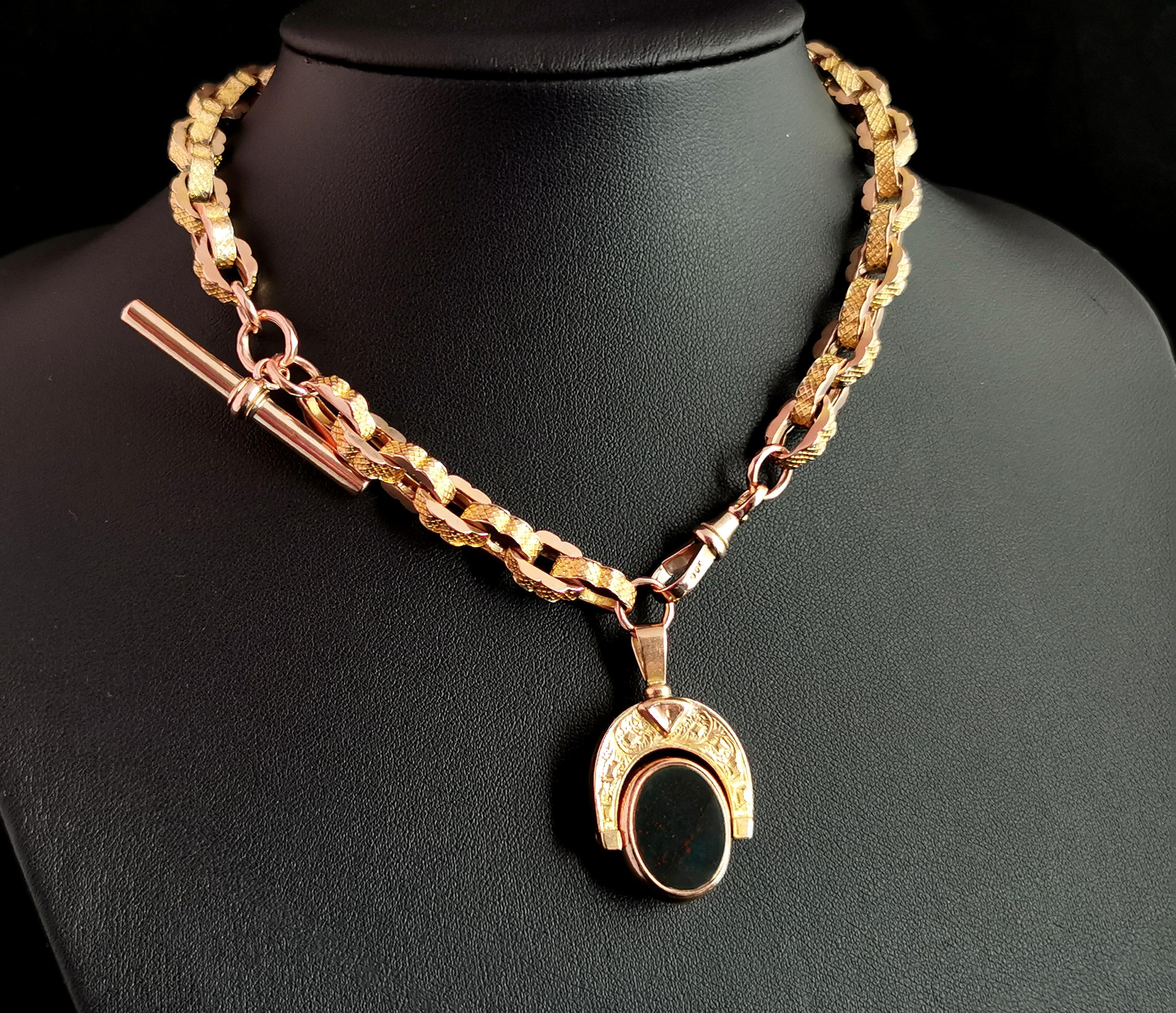 An impeccable antique Victorian era 9kt yellow gold Albert chain or watch chain.

This Albert is a single Albert chain crafted from special fancy engraved gold links, the links are very chunky but hollow so the chain remains easy to wear.

It has a